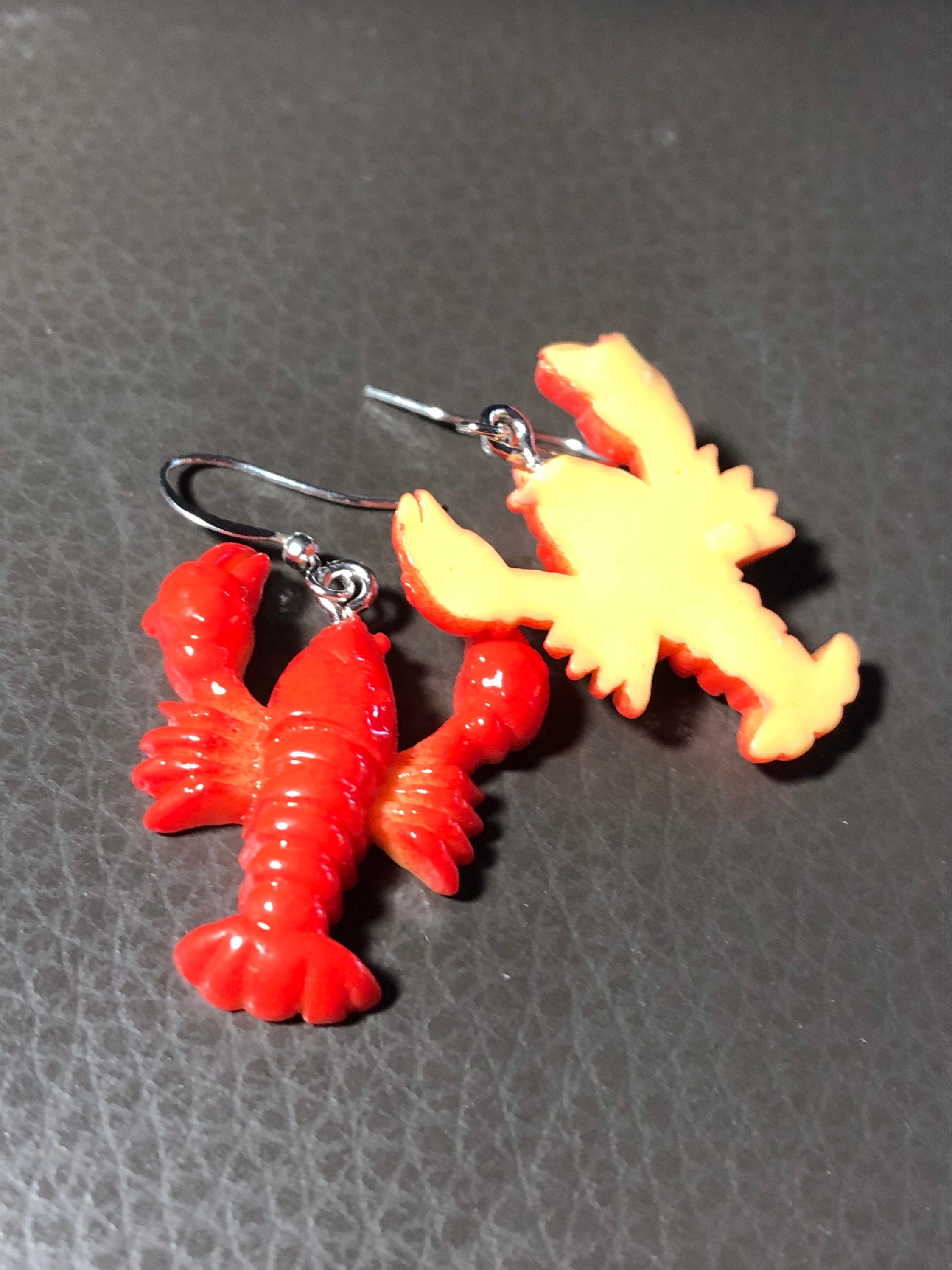 Orange plastic nautical lobster dangly earrings pierced ears