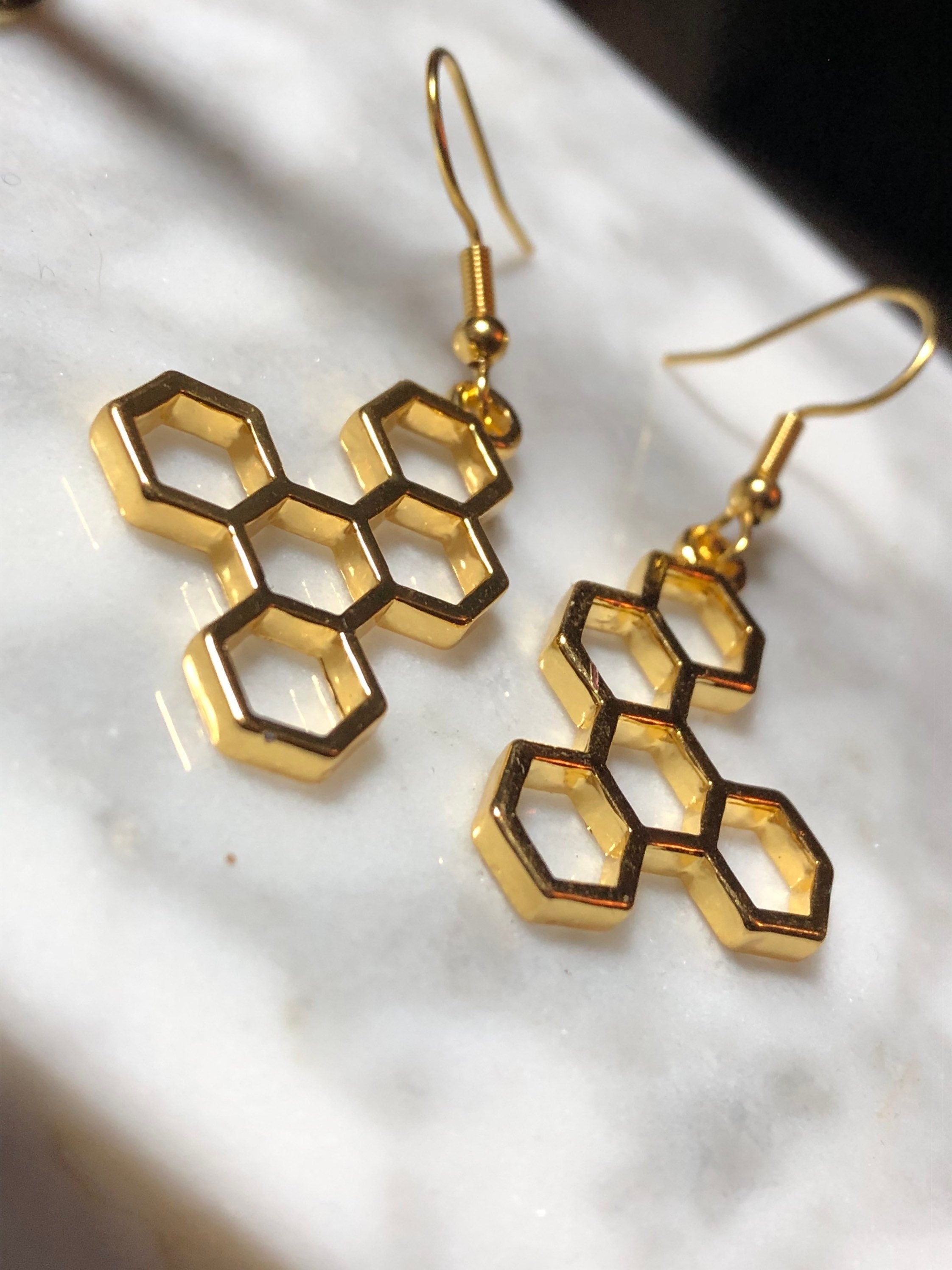 Gold tone honey bee honeycomb drop earrings