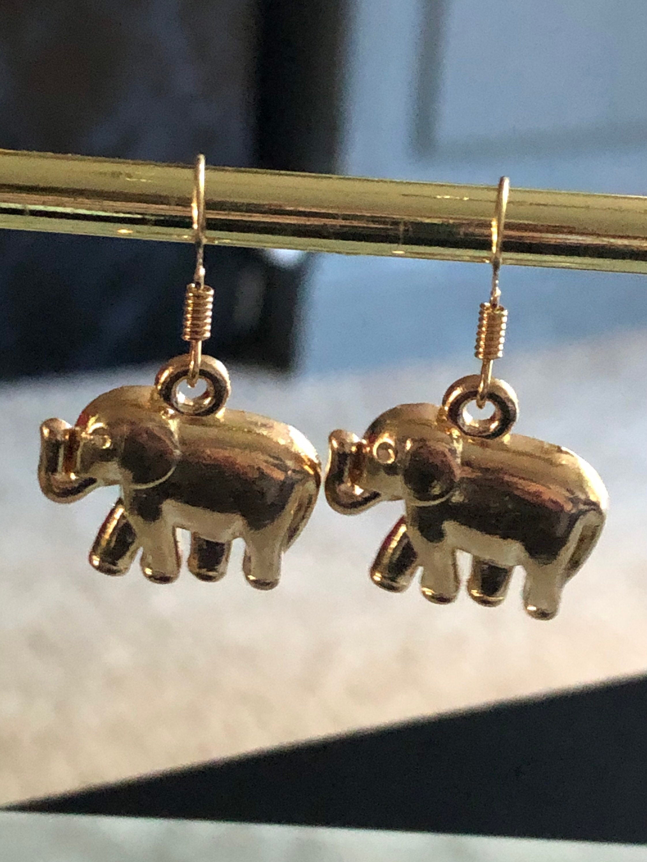 Small gold tone elephant drop earrings for pierced ears