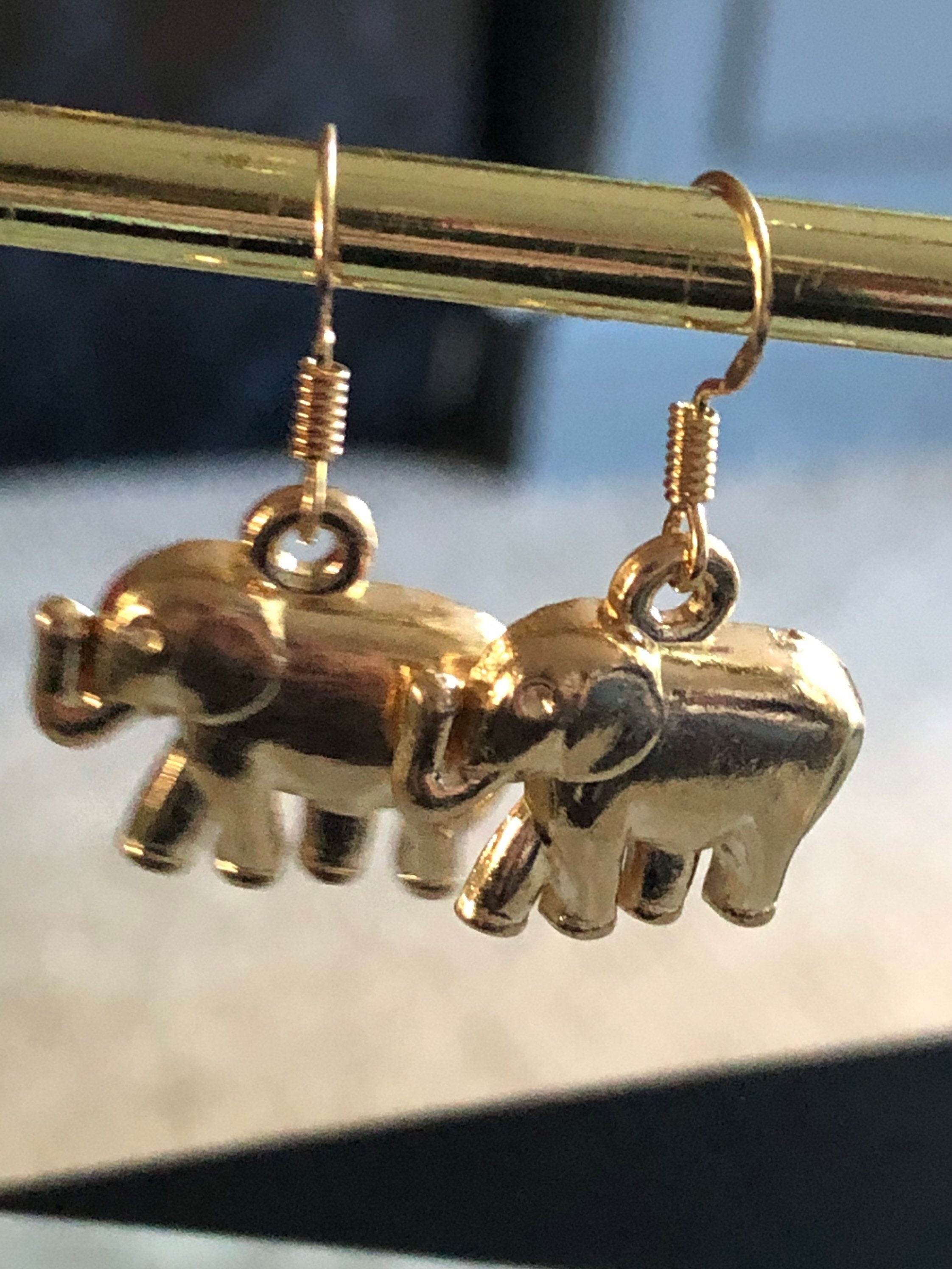 Small gold tone elephant drop earrings for pierced ears