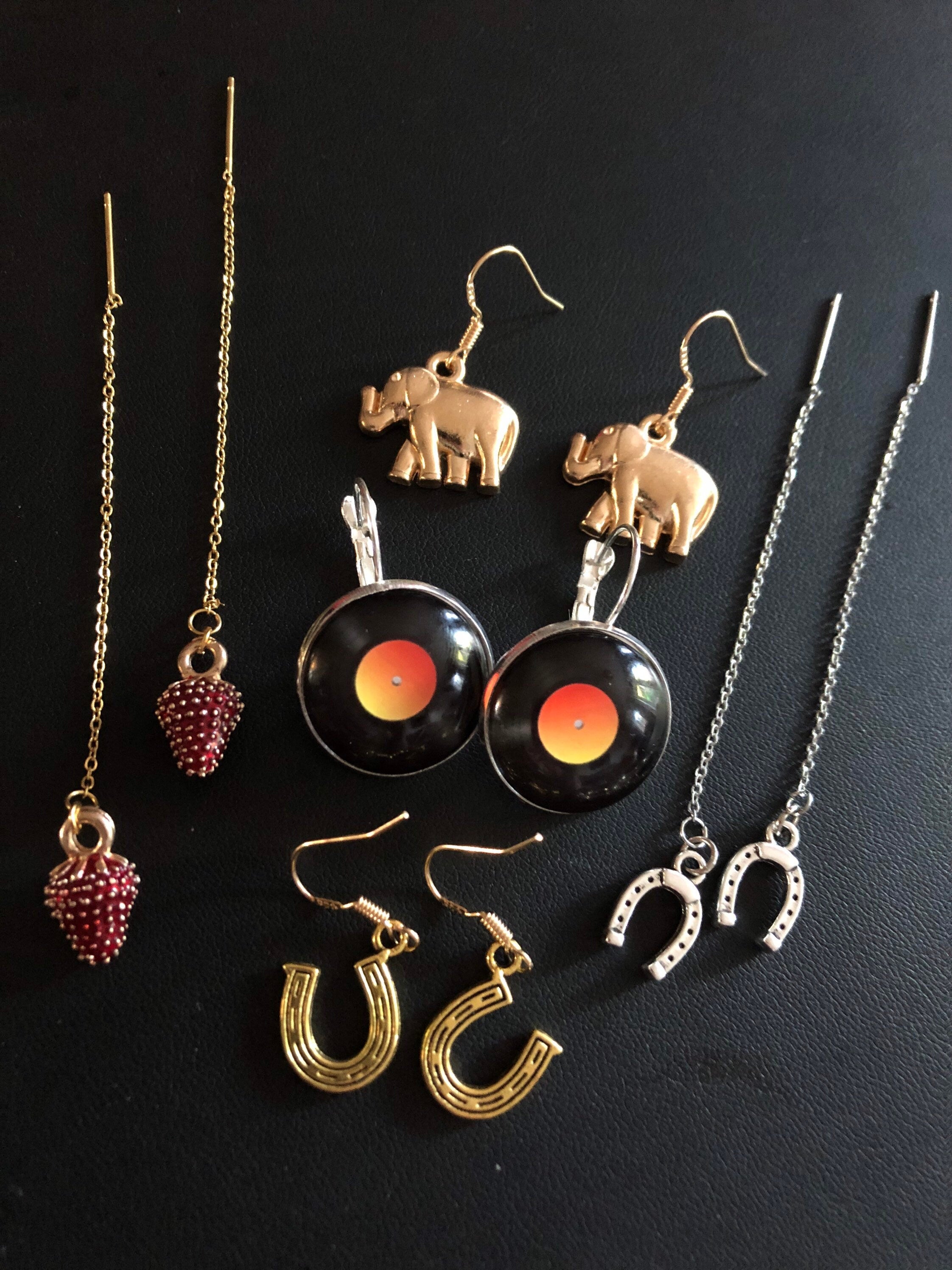 Small gold tone elephant drop earrings for pierced ears