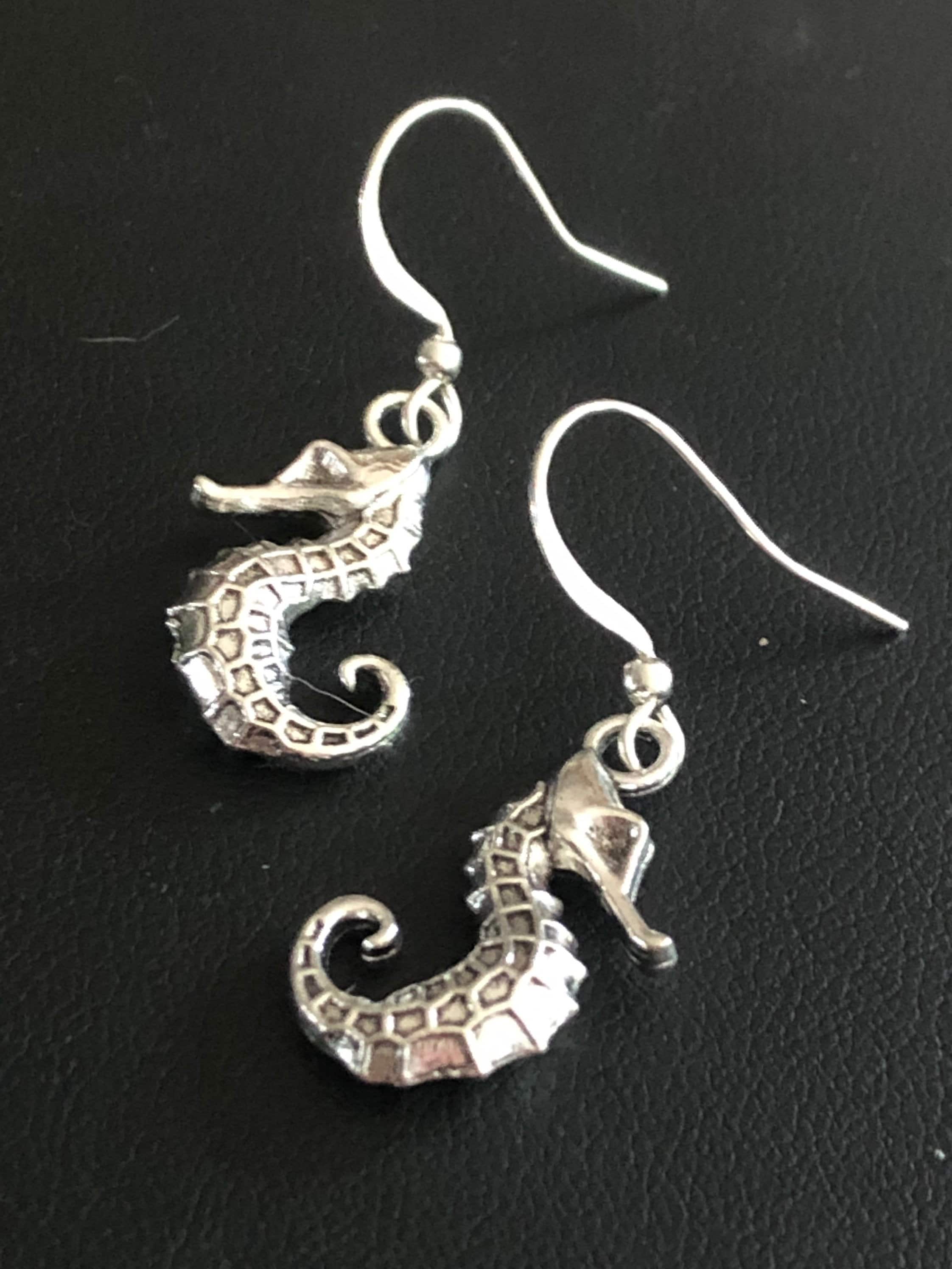 small seahorse drop earrings pierced ears