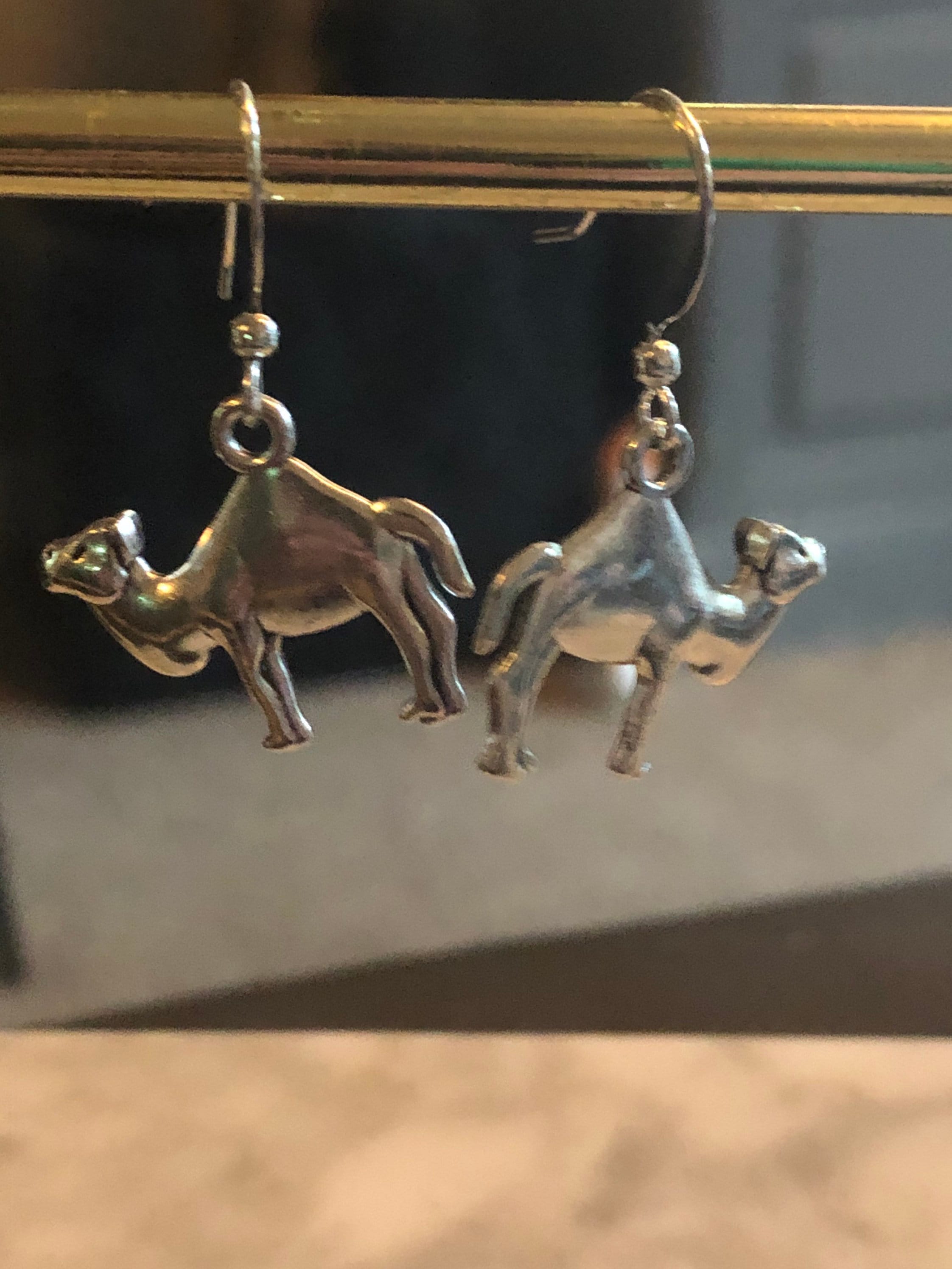 silver tone camel drop earrings pierced