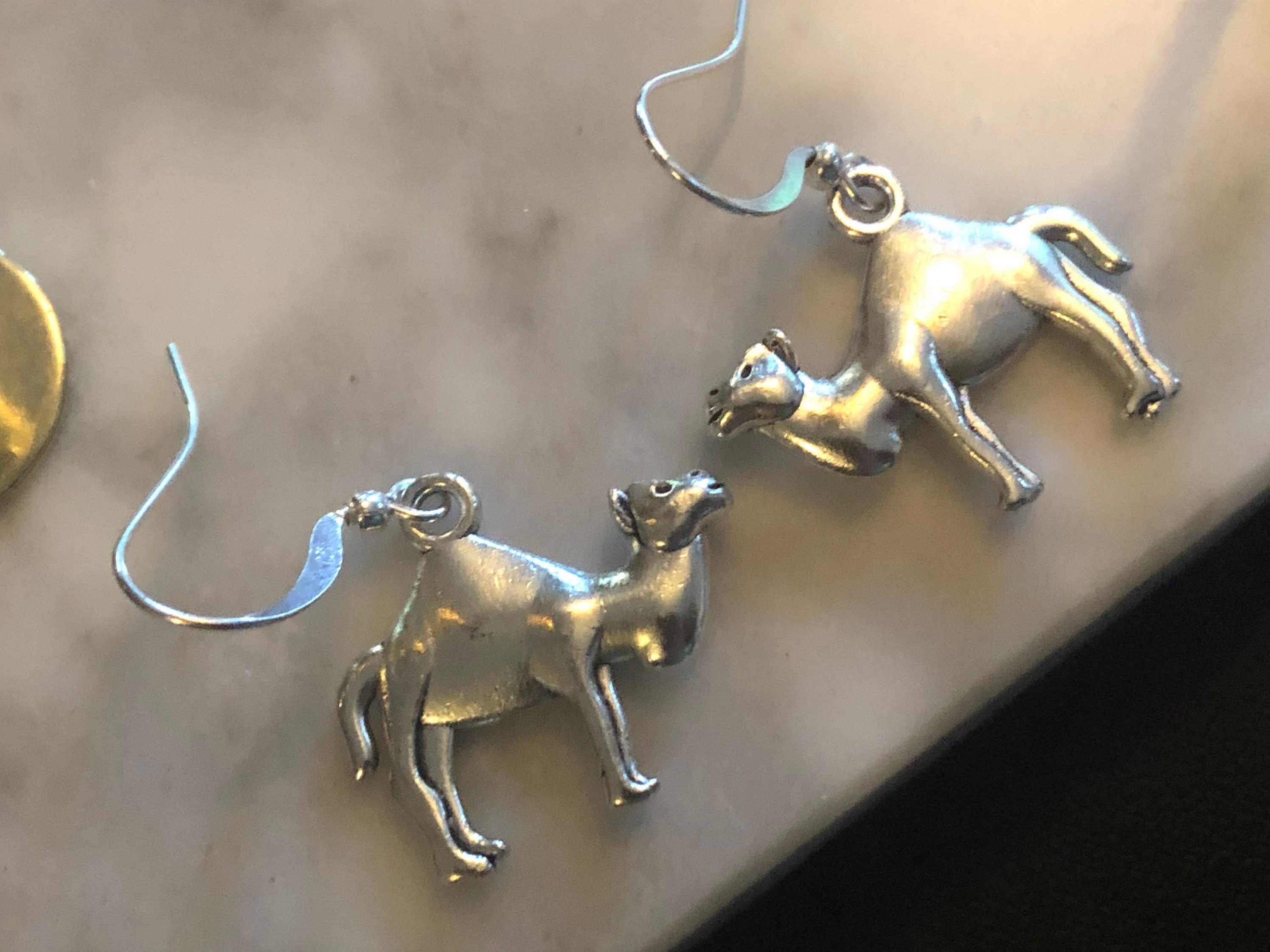 silver tone camel drop earrings pierced