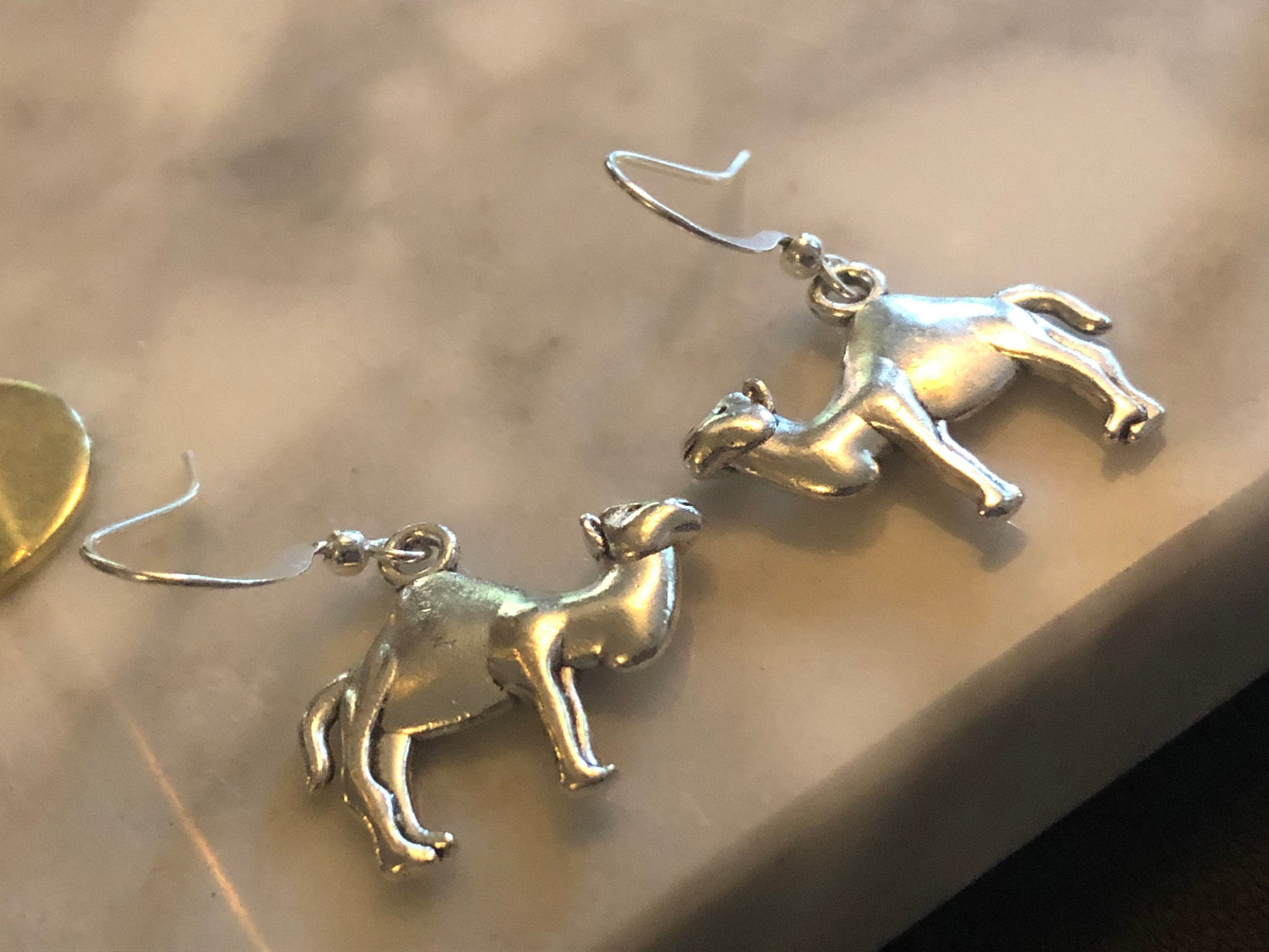 silver tone camel drop earrings pierced