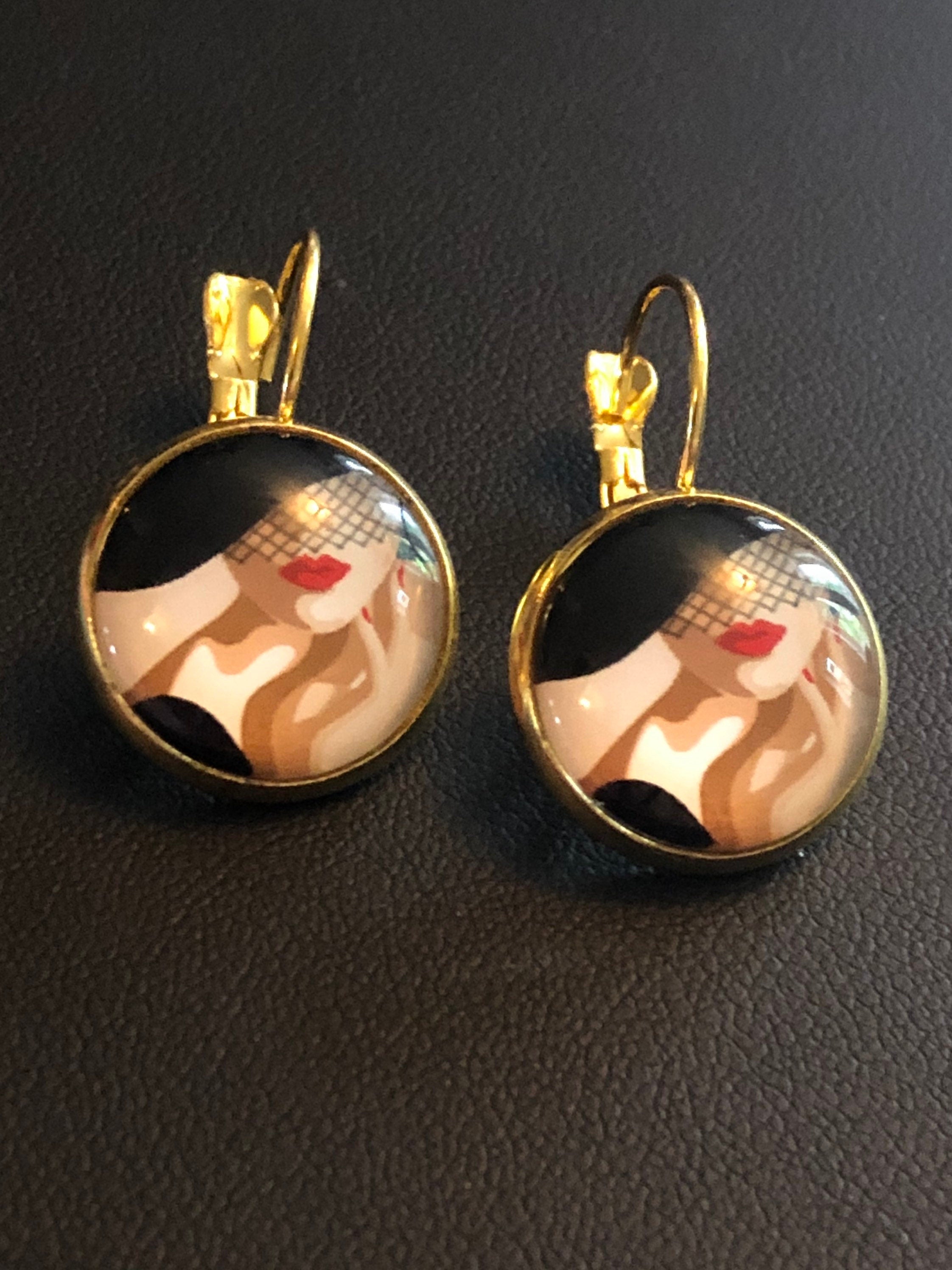 Gold tone Art Deco lady monochrome drop earrings