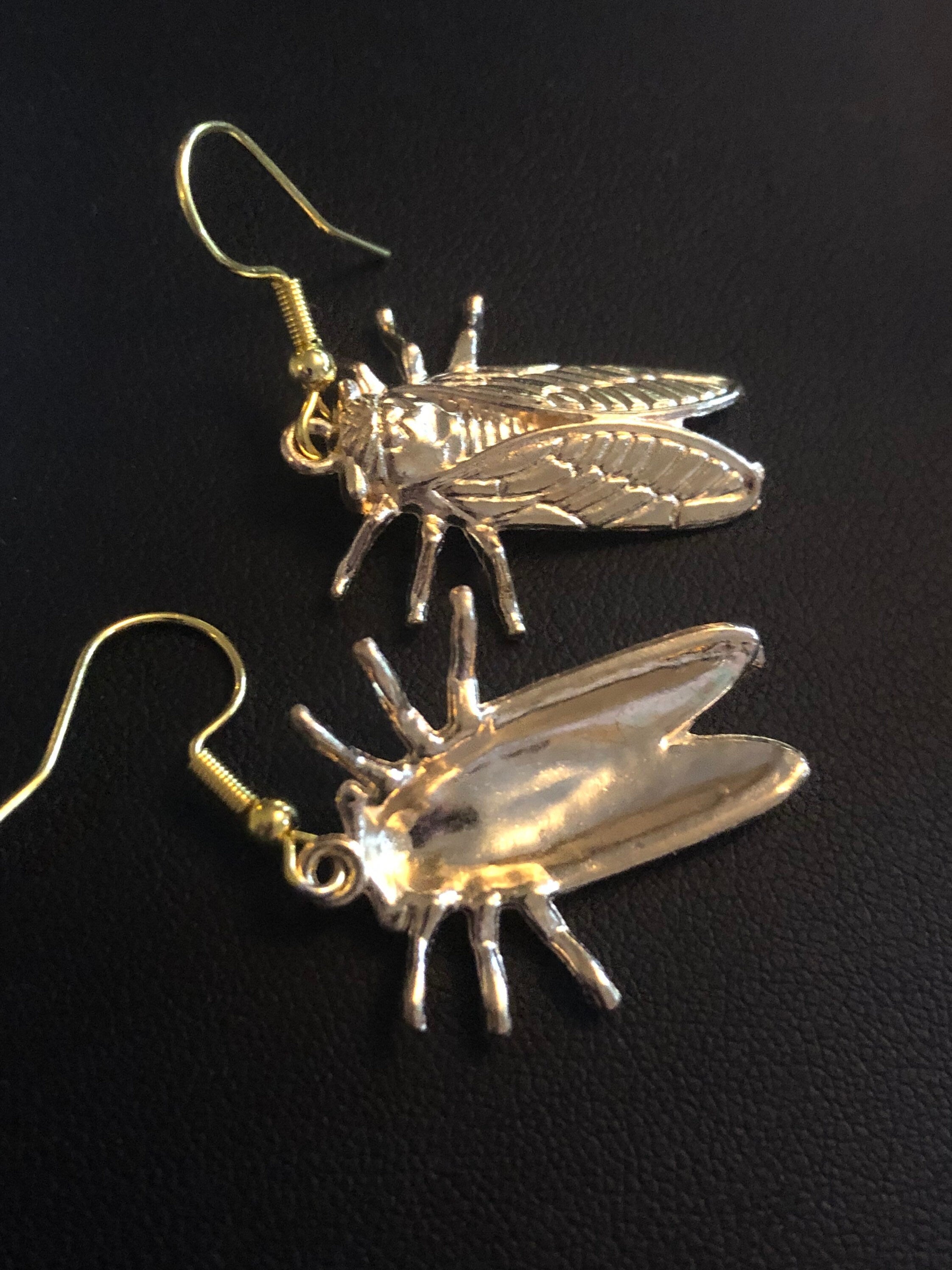 gold tone Cicada bug earrings for pierced ears