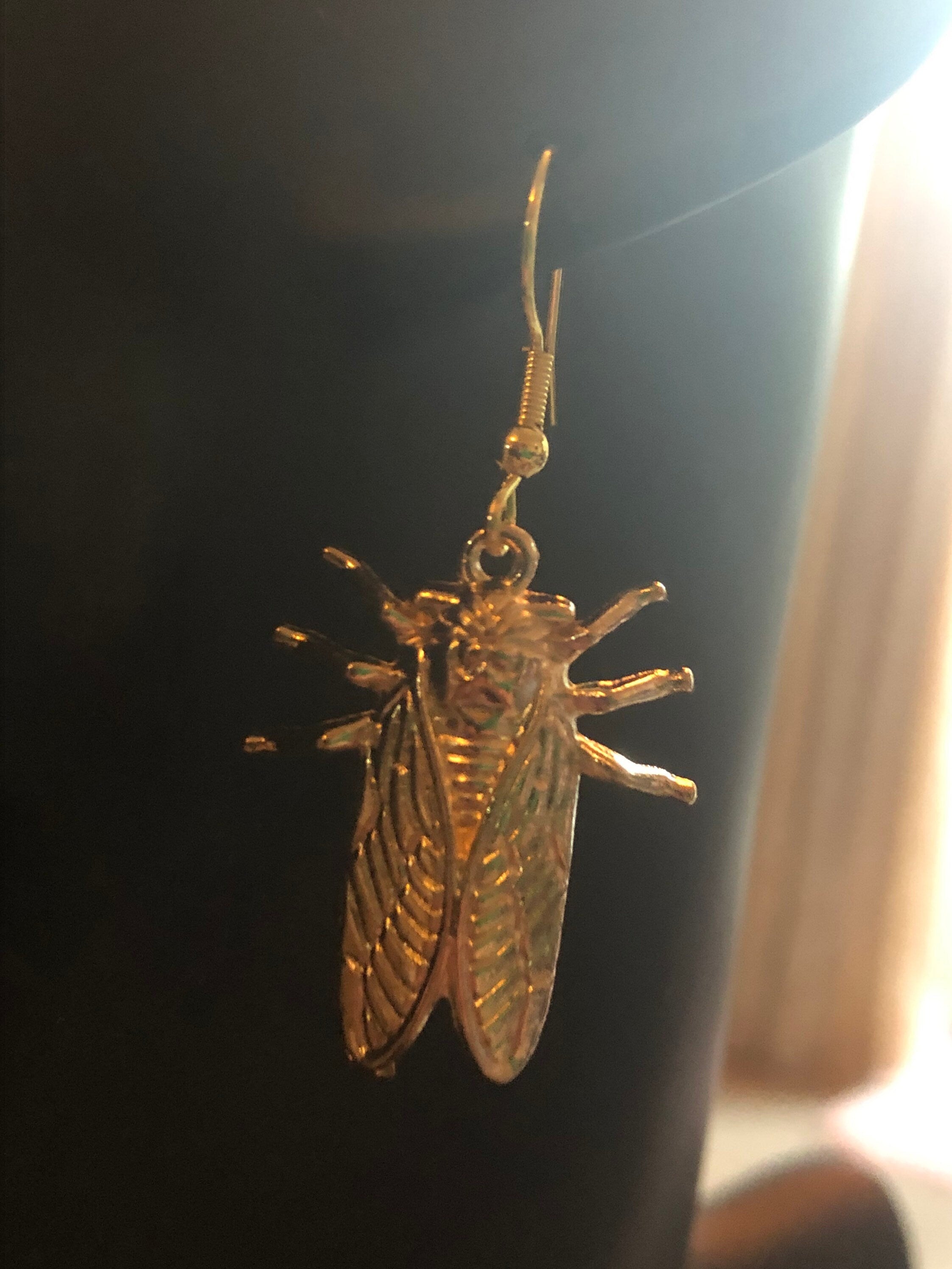 gold tone Cicada bug earrings for pierced ears