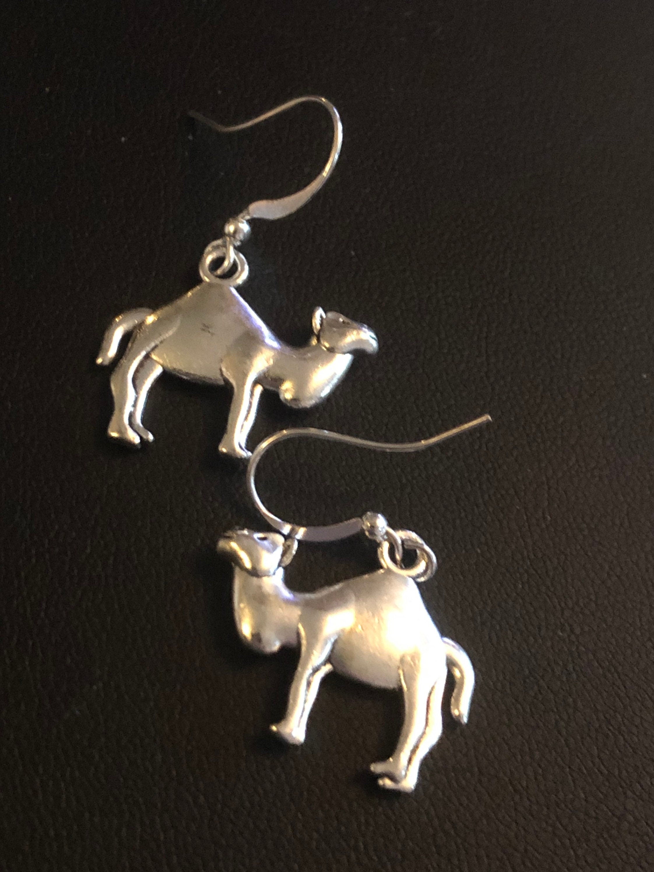 silver tone camel drop earrings pierced
