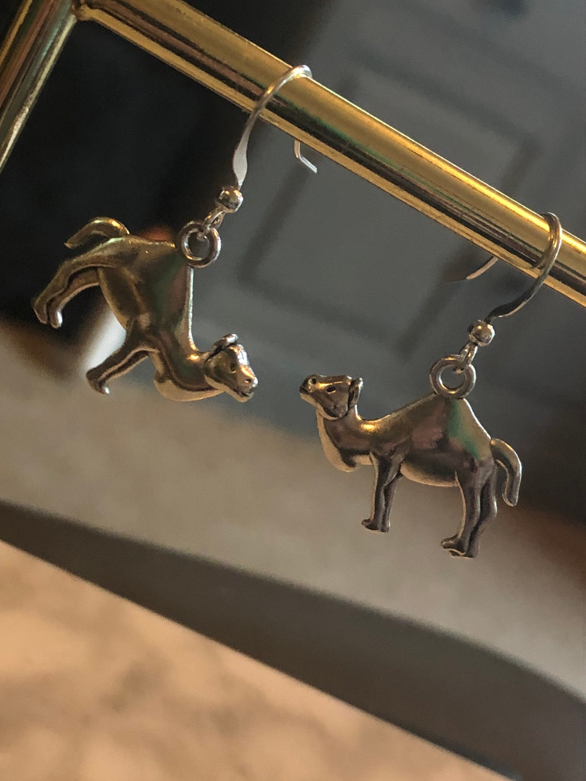silver tone camel drop earrings pierced