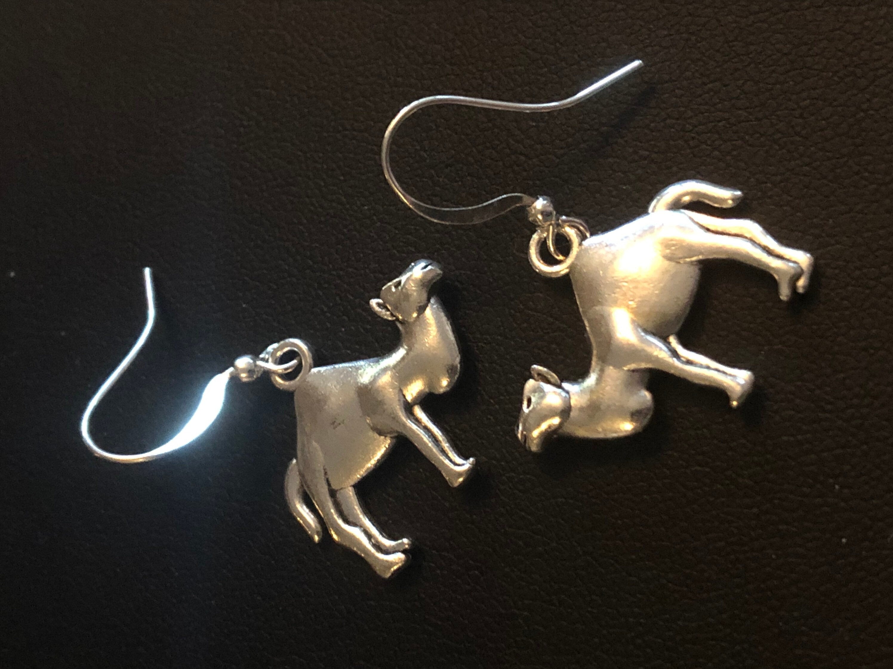 silver tone camel drop earrings pierced