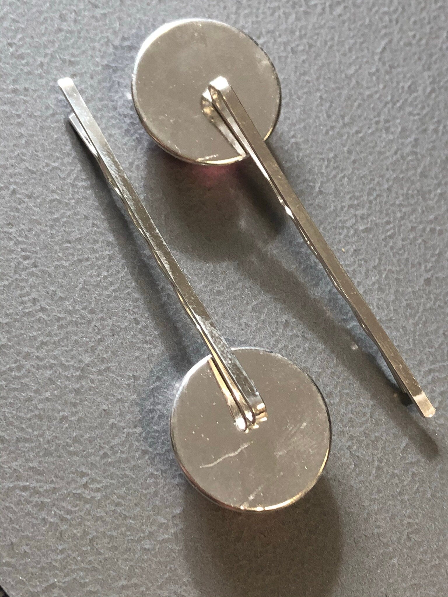 pair of red ditsy floral roses hair clips silver tone