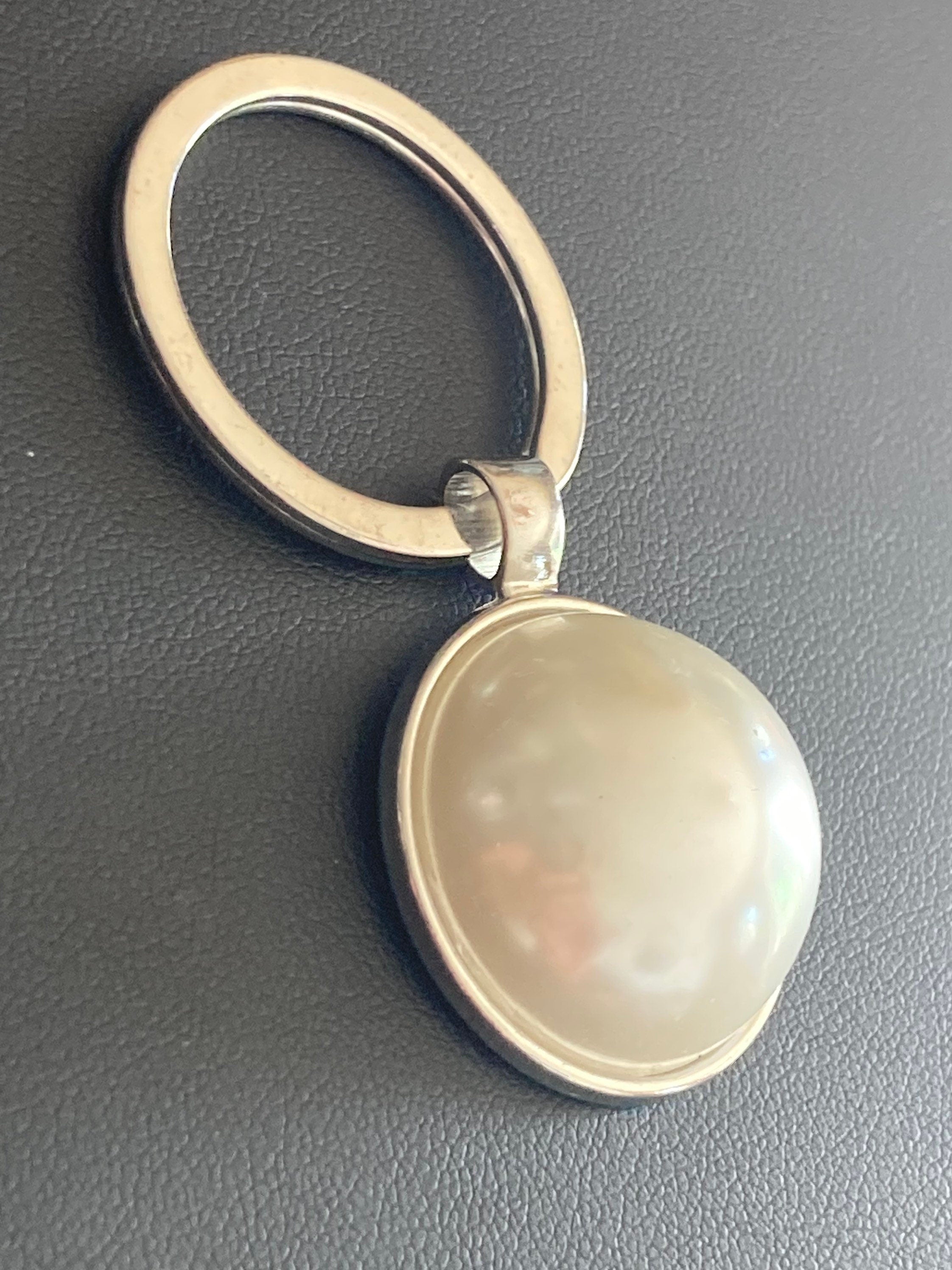 white faux Pearl silver keyring with 25mm plastic domed Pearl cabochon