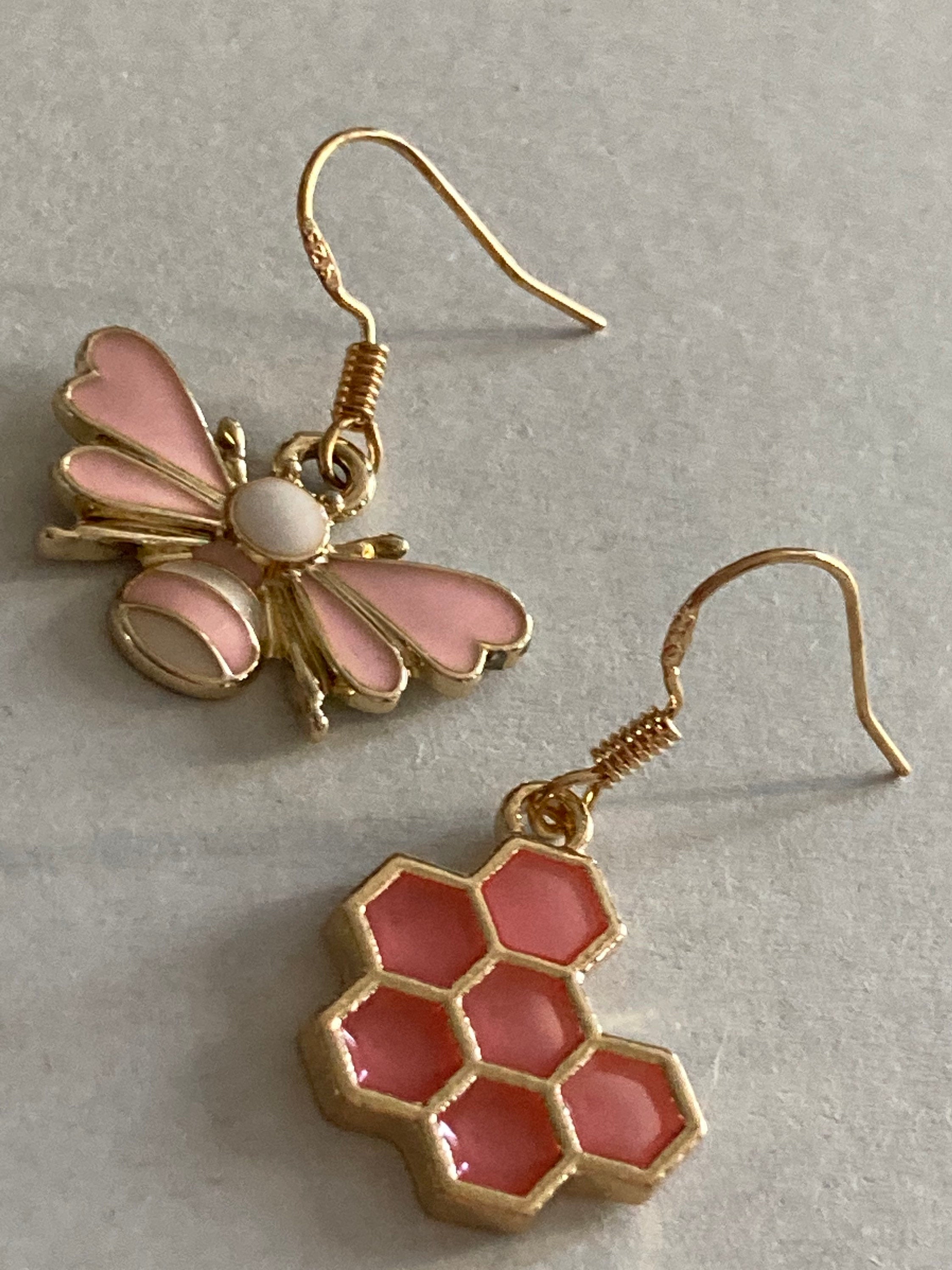 Gold tone pink bumble bee and pink honeycomb drop earrings