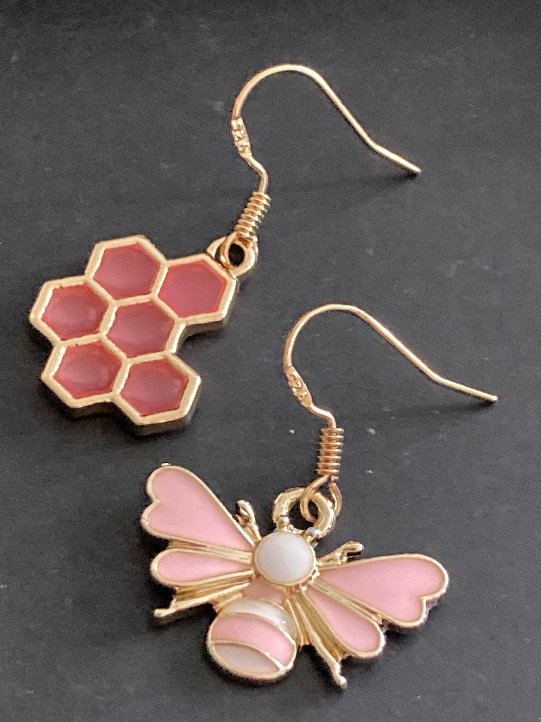 Gold tone pink bumble bee and pink honeycomb drop earrings