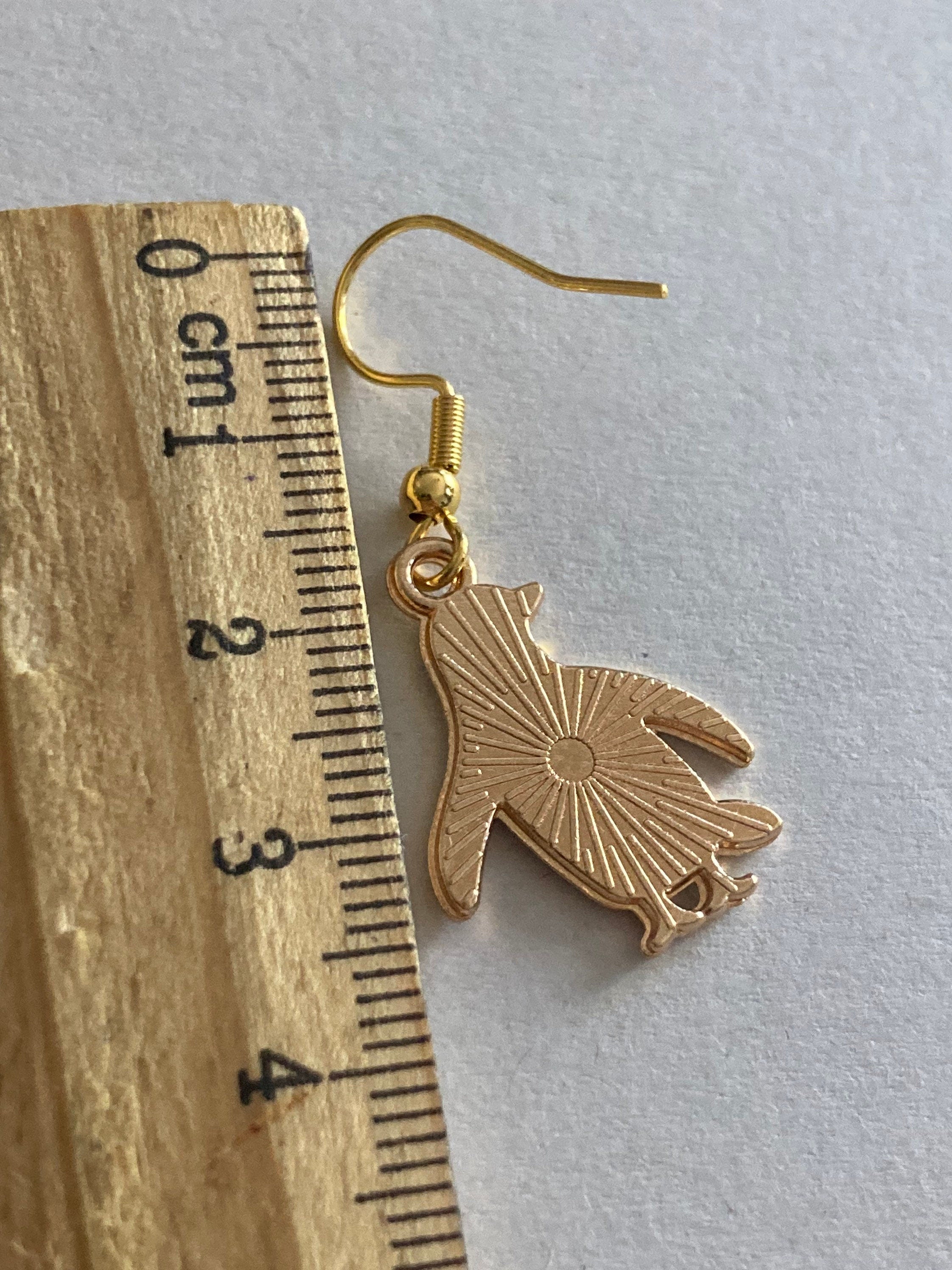 penguin drop earrings Gold tone black white enamel