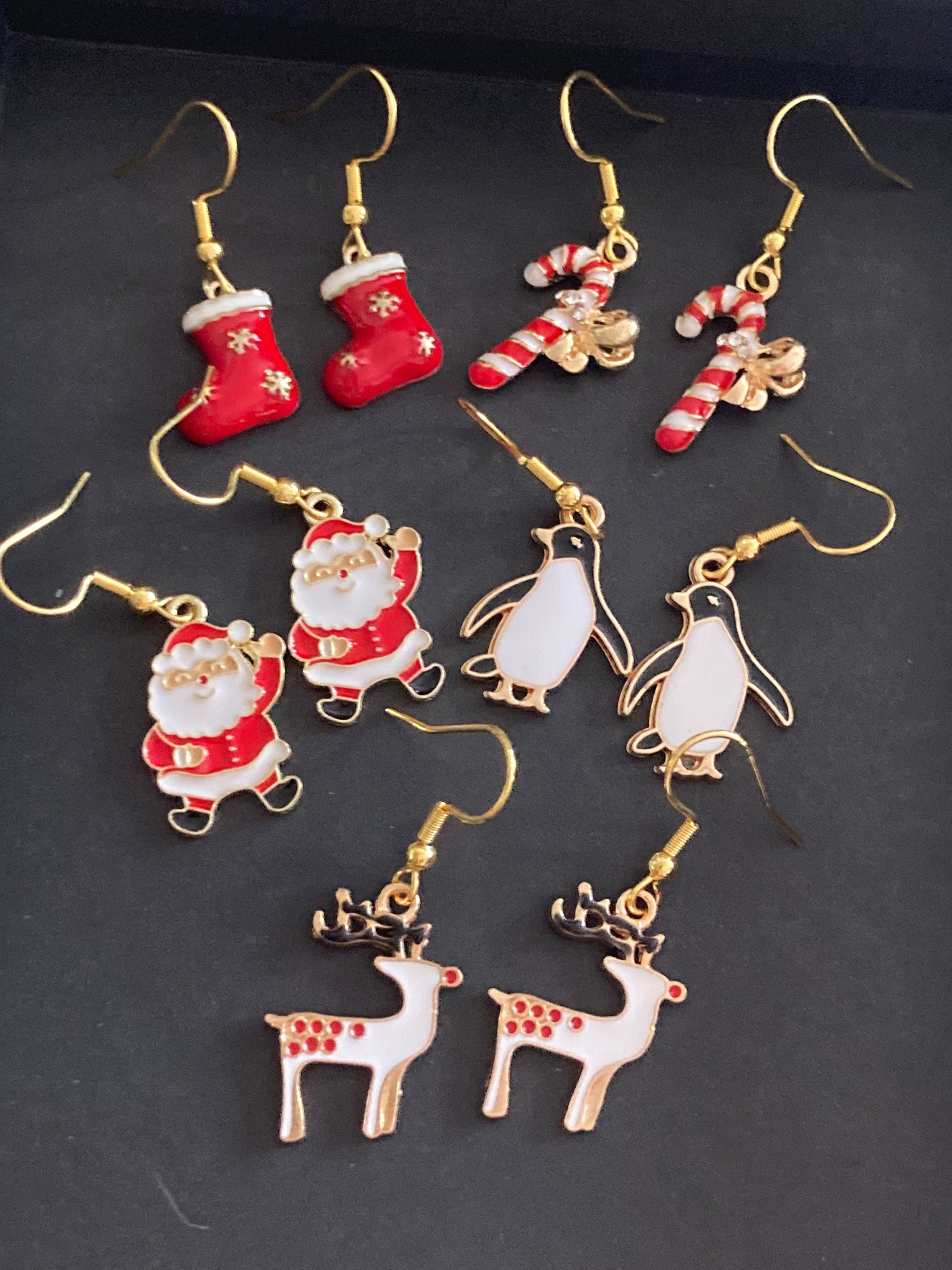 red and white enamel striped candy cane drop earrings for pierced ears