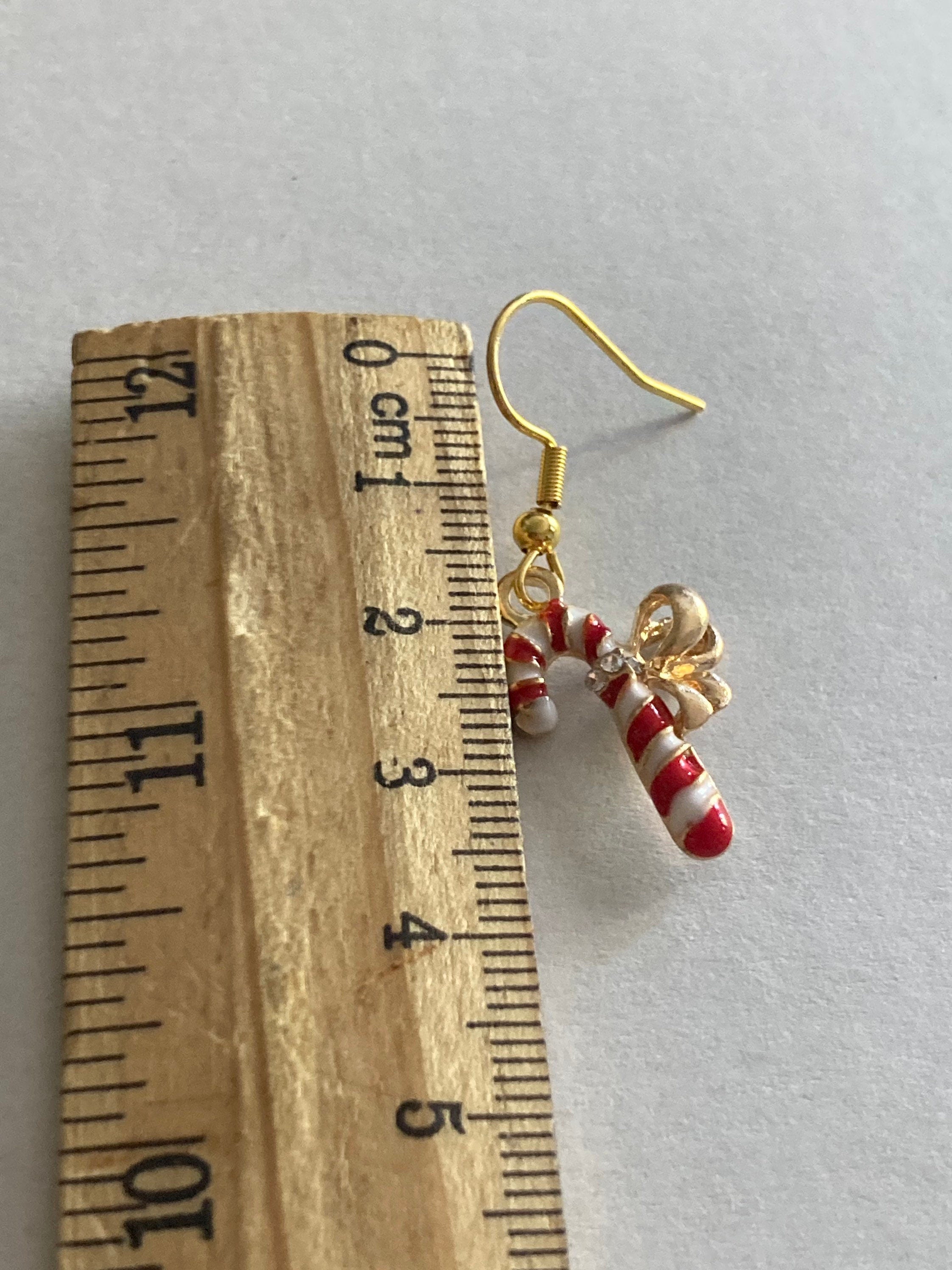 red and white enamel striped candy cane drop earrings for pierced ears