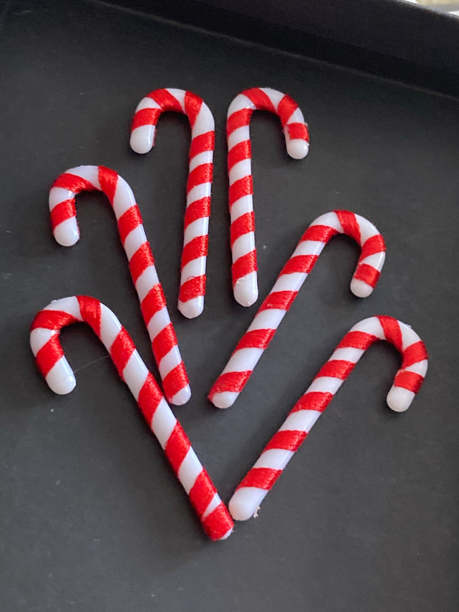 Christmas red and white candy cane cake toppers , 6 x 5cm long plastic and ribbon