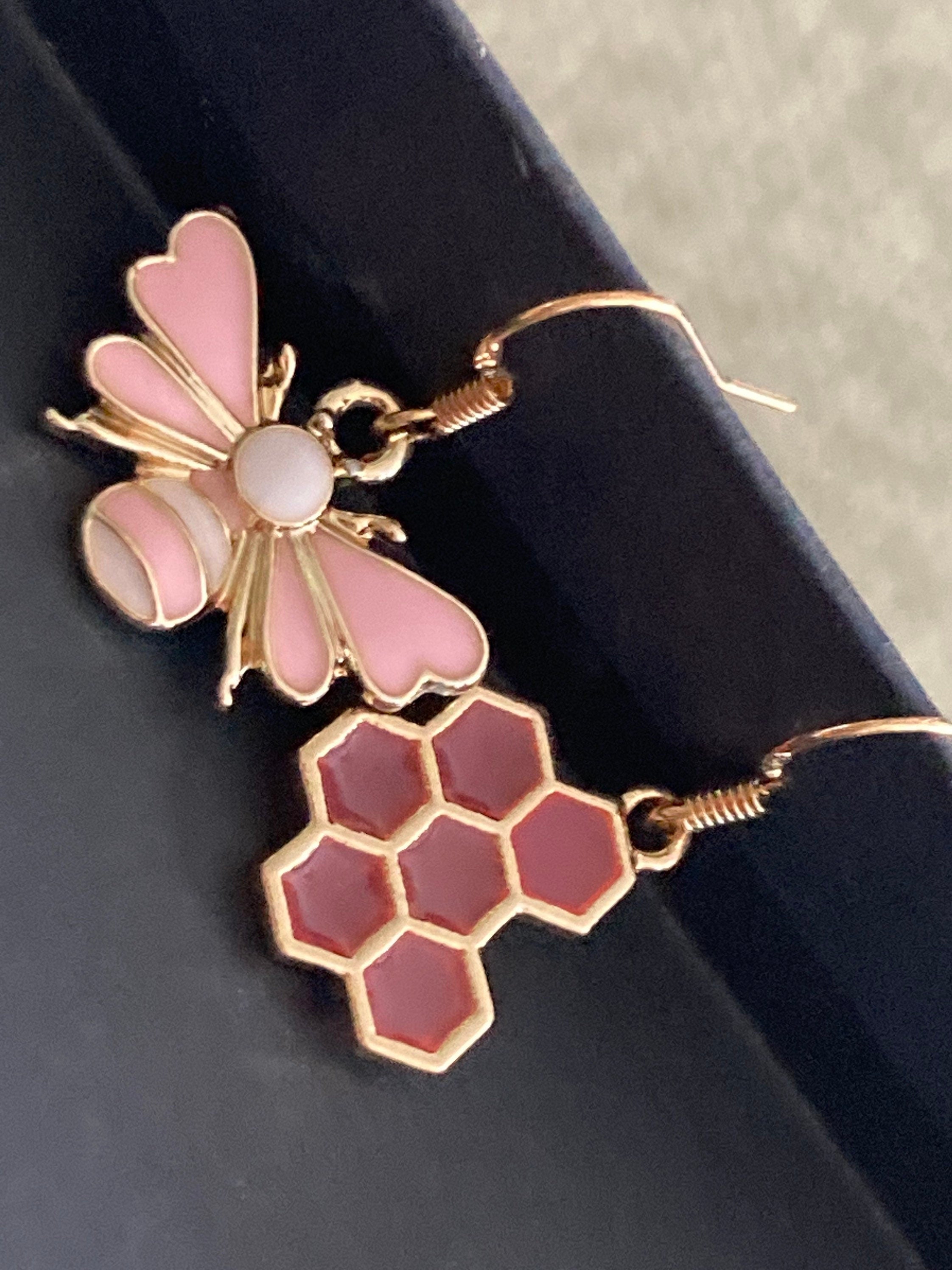 Gold tone pink bumble bee and pink honeycomb drop earrings
