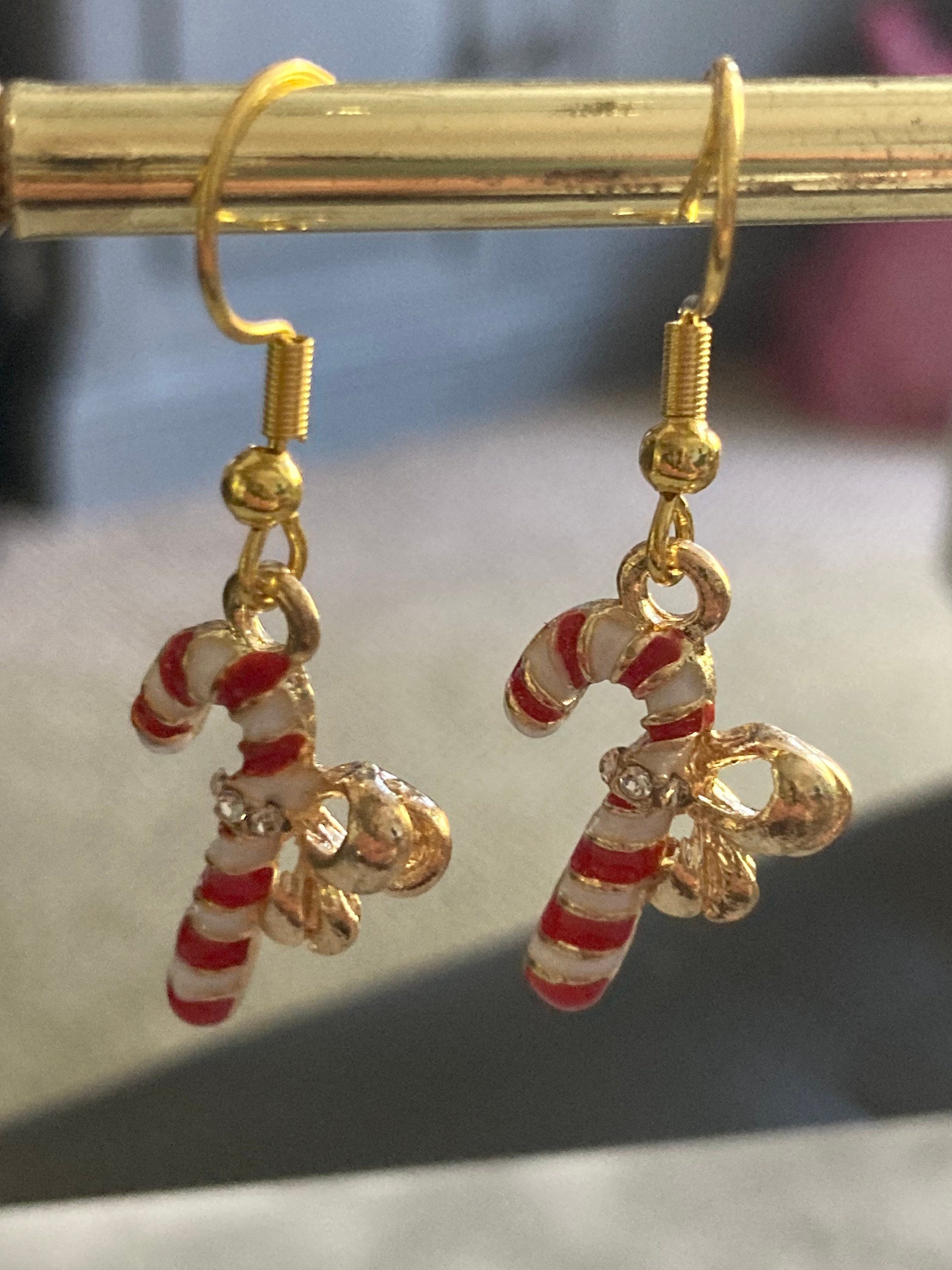 red and white enamel striped candy cane drop earrings for pierced ears