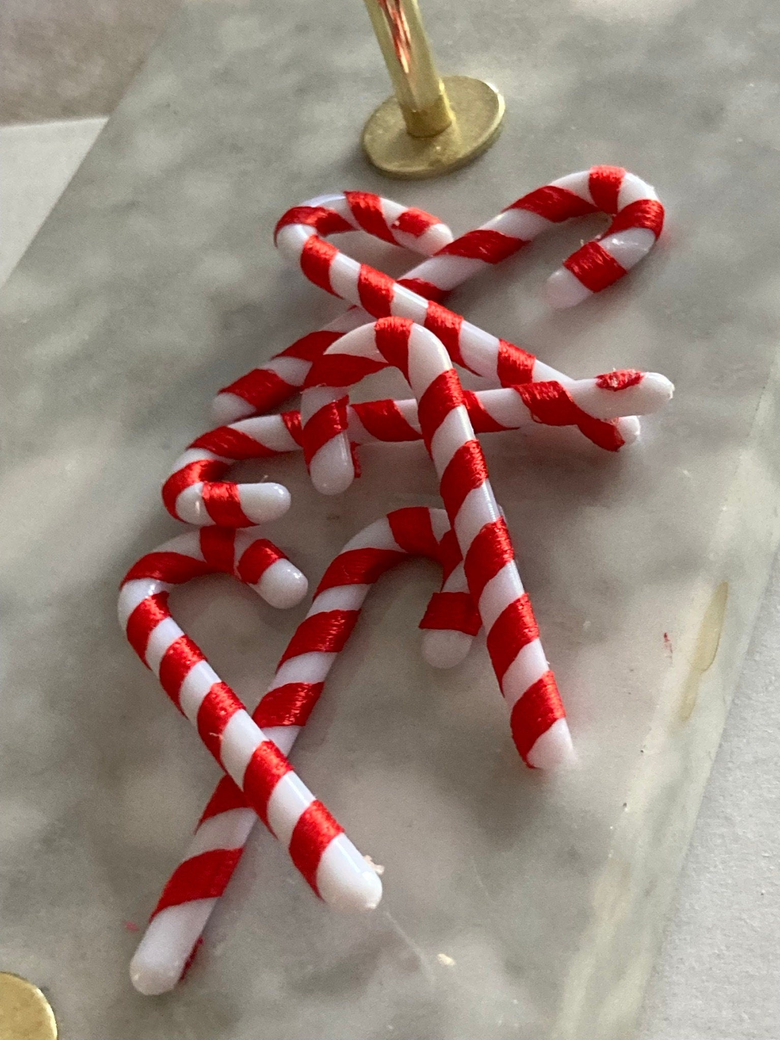 Christmas red and white candy cane cake toppers , 6 x 5cm long plastic and ribbon