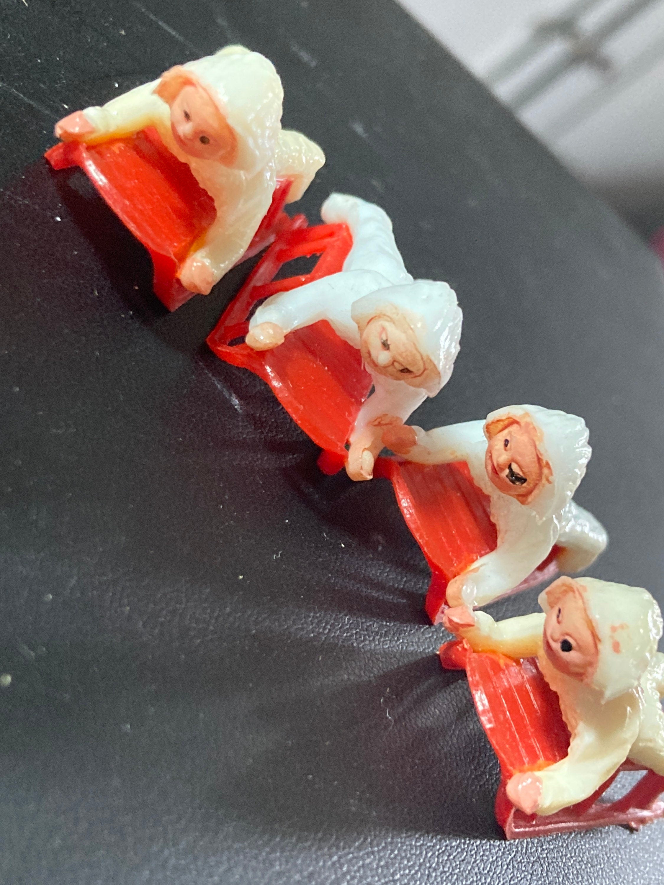 Vintage 1960s 1 x miniature snow boy on sledge snow baby Christmas cake topper