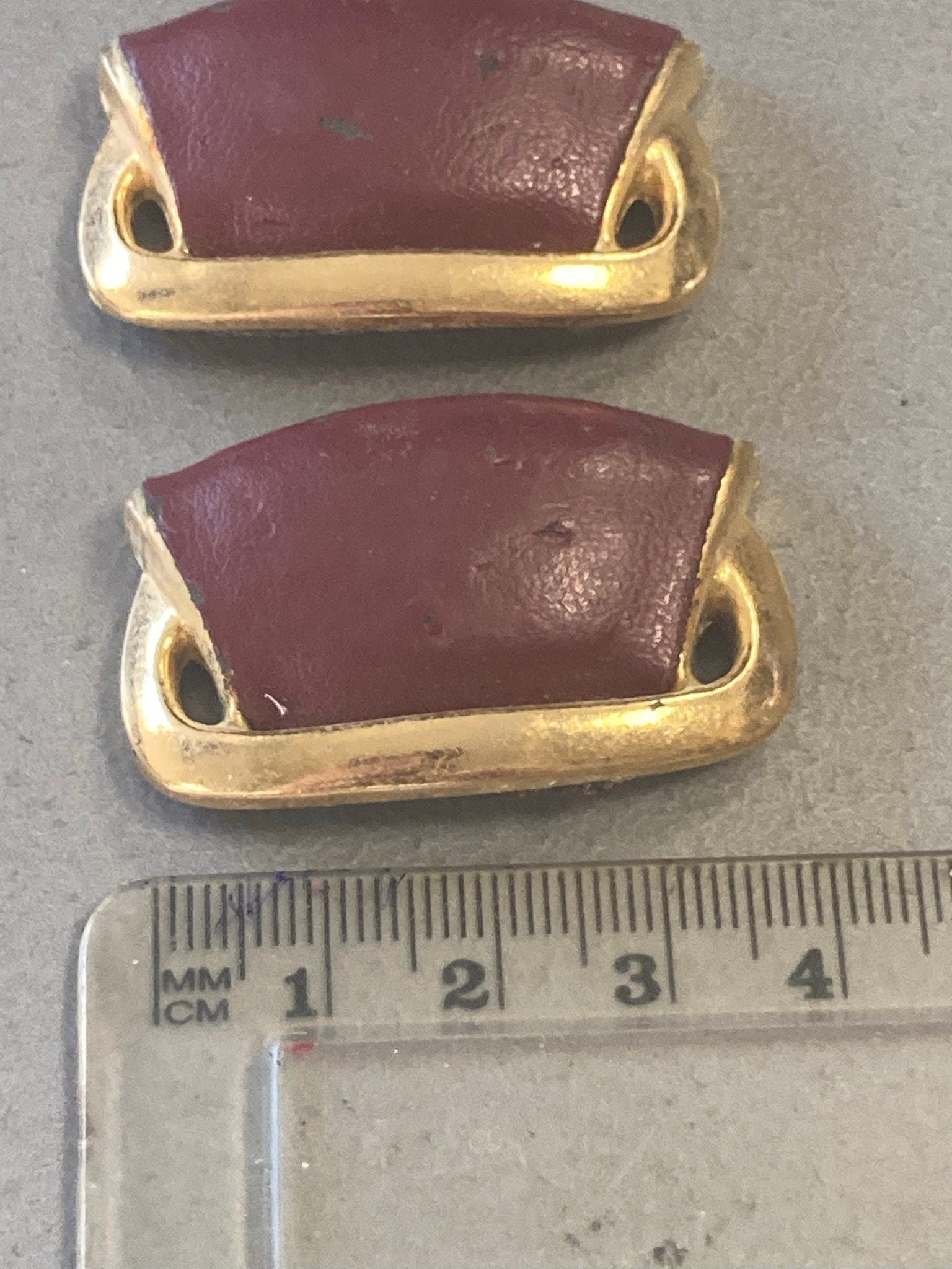 pair of Maroon Burgundy Oxblood red leather and gold tone shoe clips