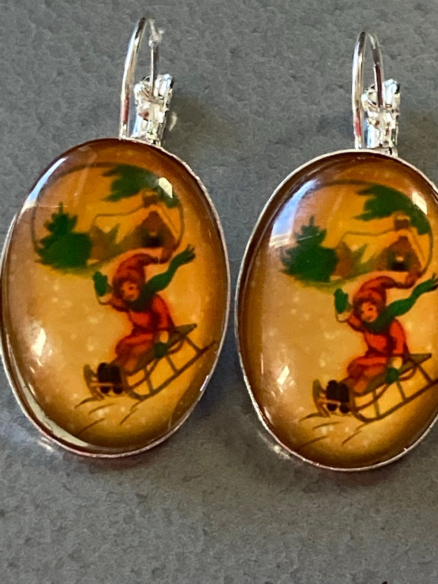 children on sledges pierced drop earrings ear wires
