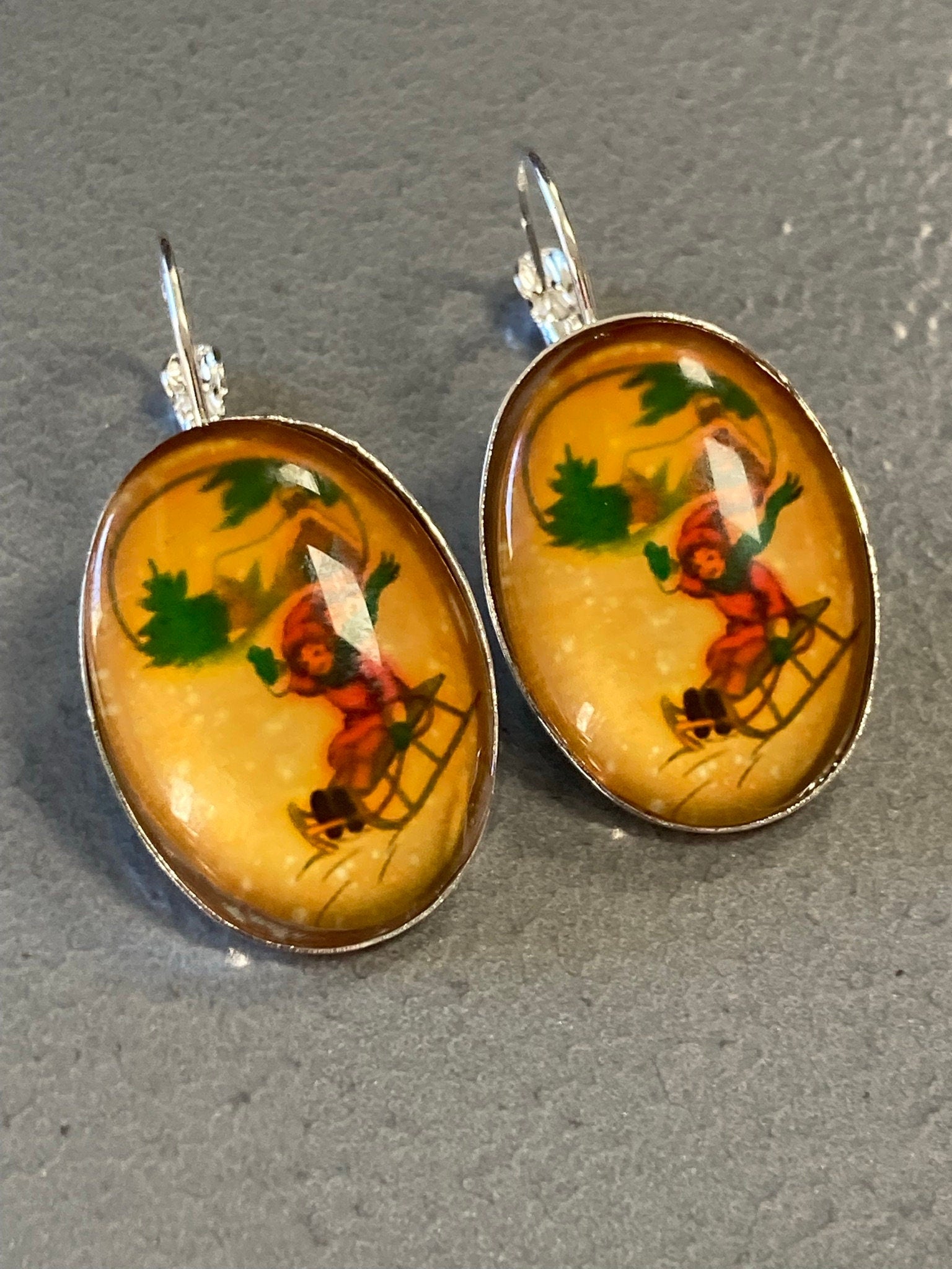 children on sledges pierced drop earrings ear wires