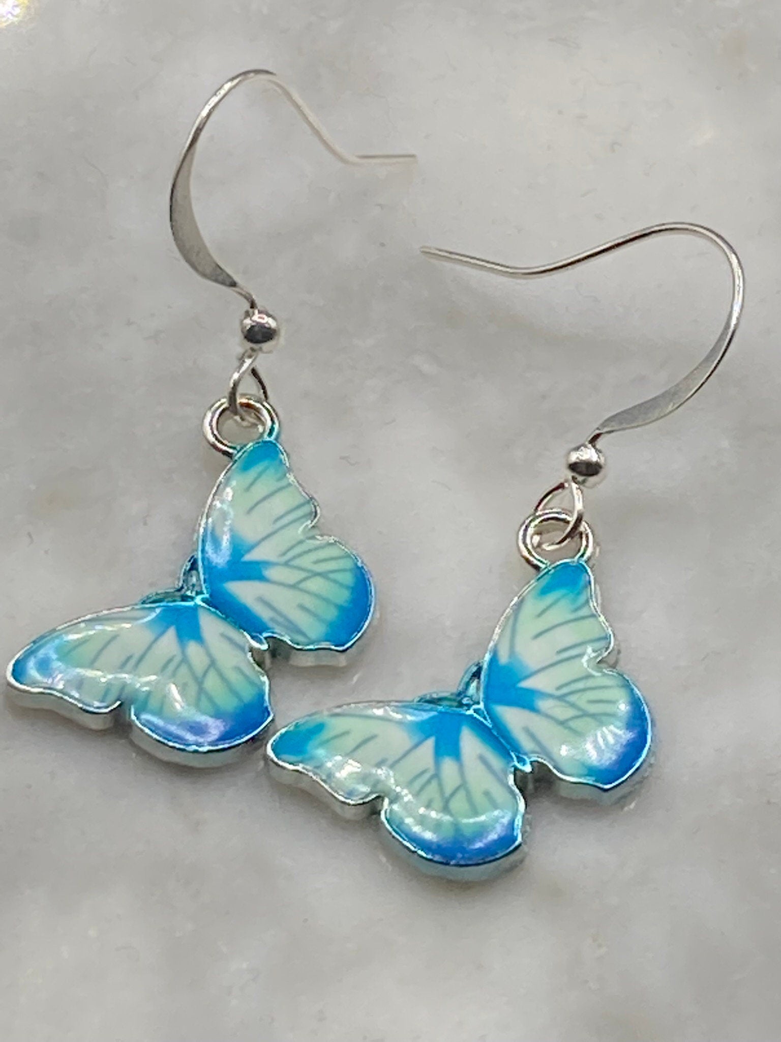 Silver tone blue morpho butterfly earrings