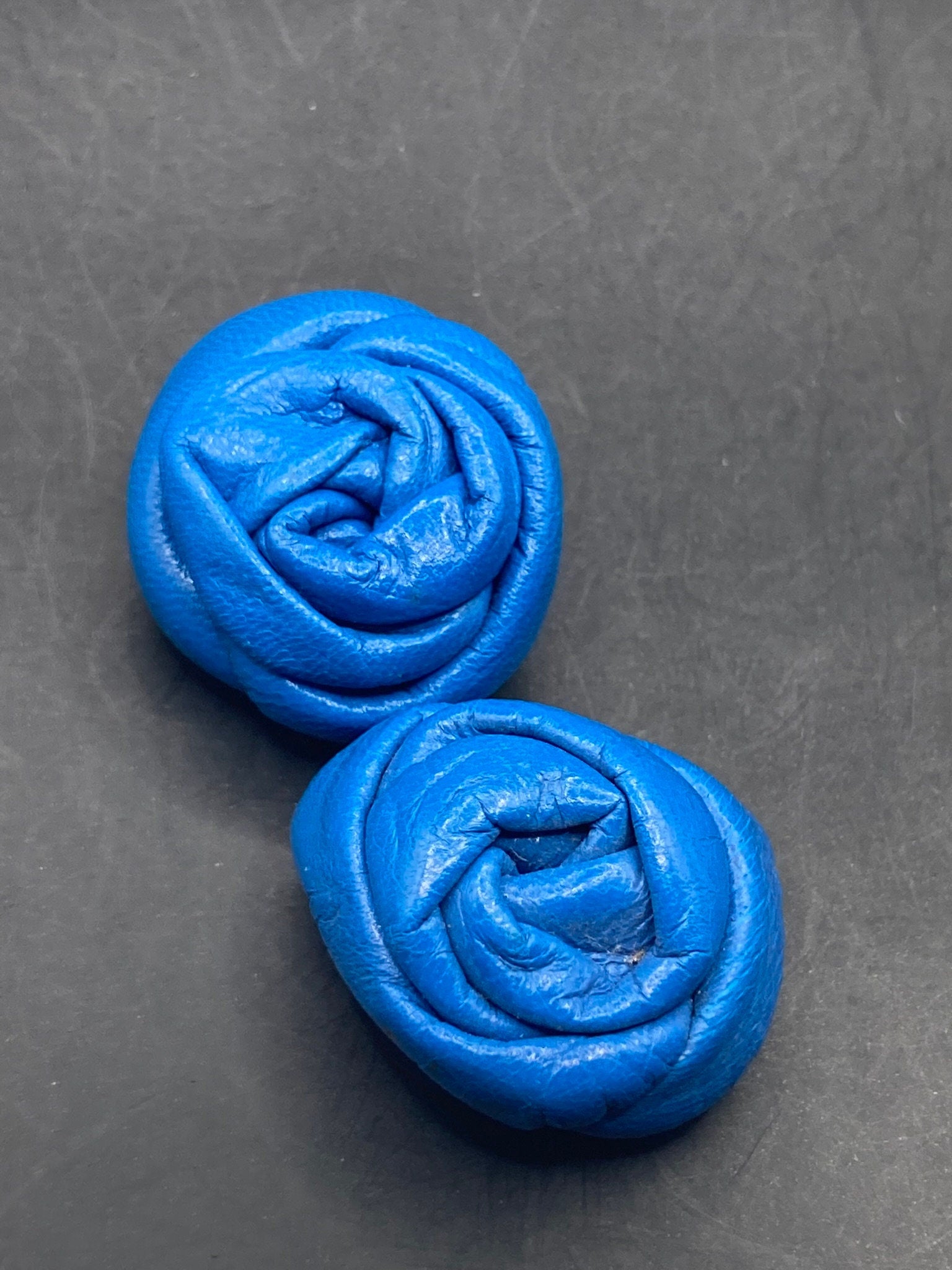 Vintage soft Leather pair of bright blue flower twist shoe clips 1980s