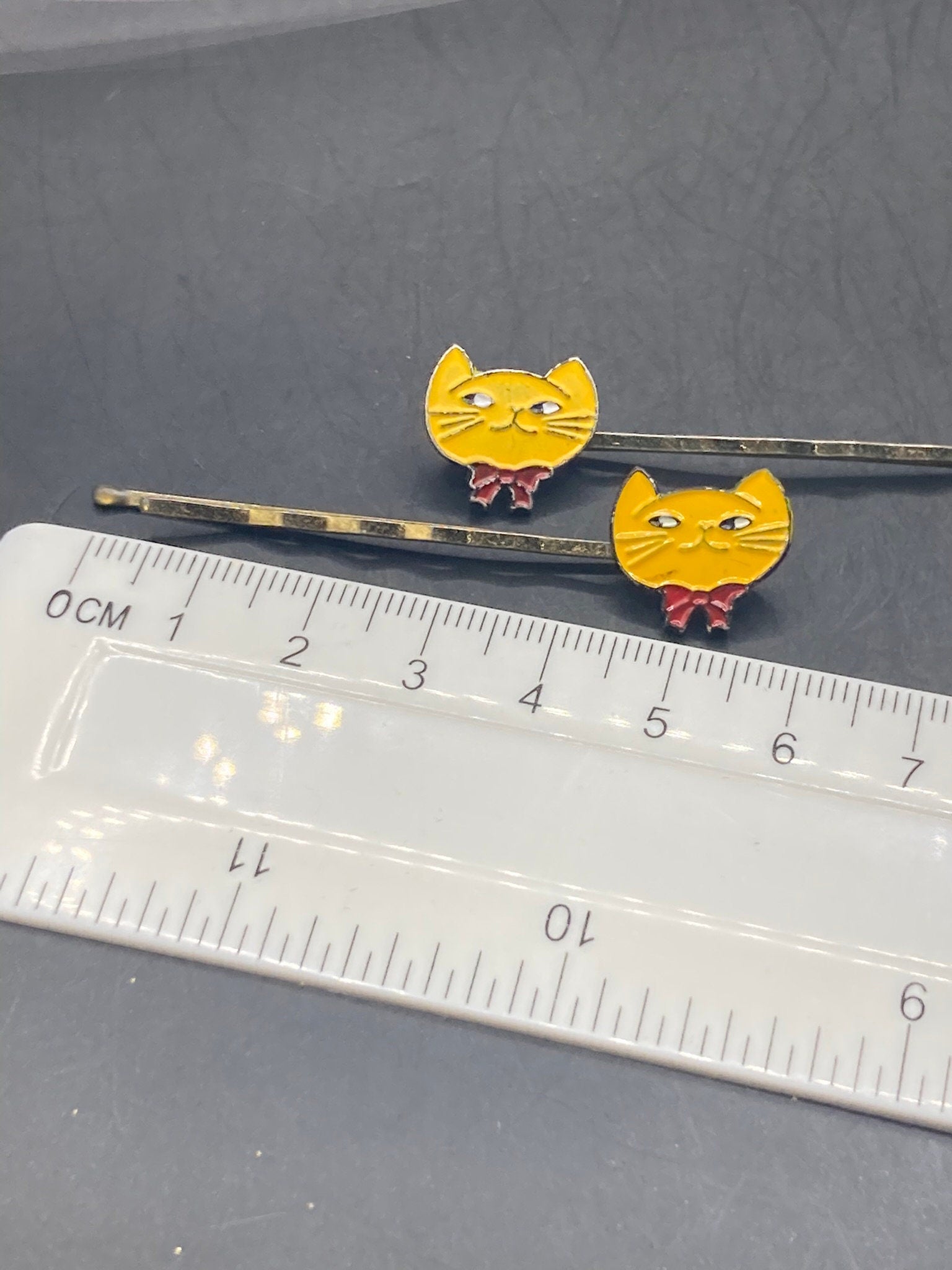 Pair yellow enamel cat girls hair slides