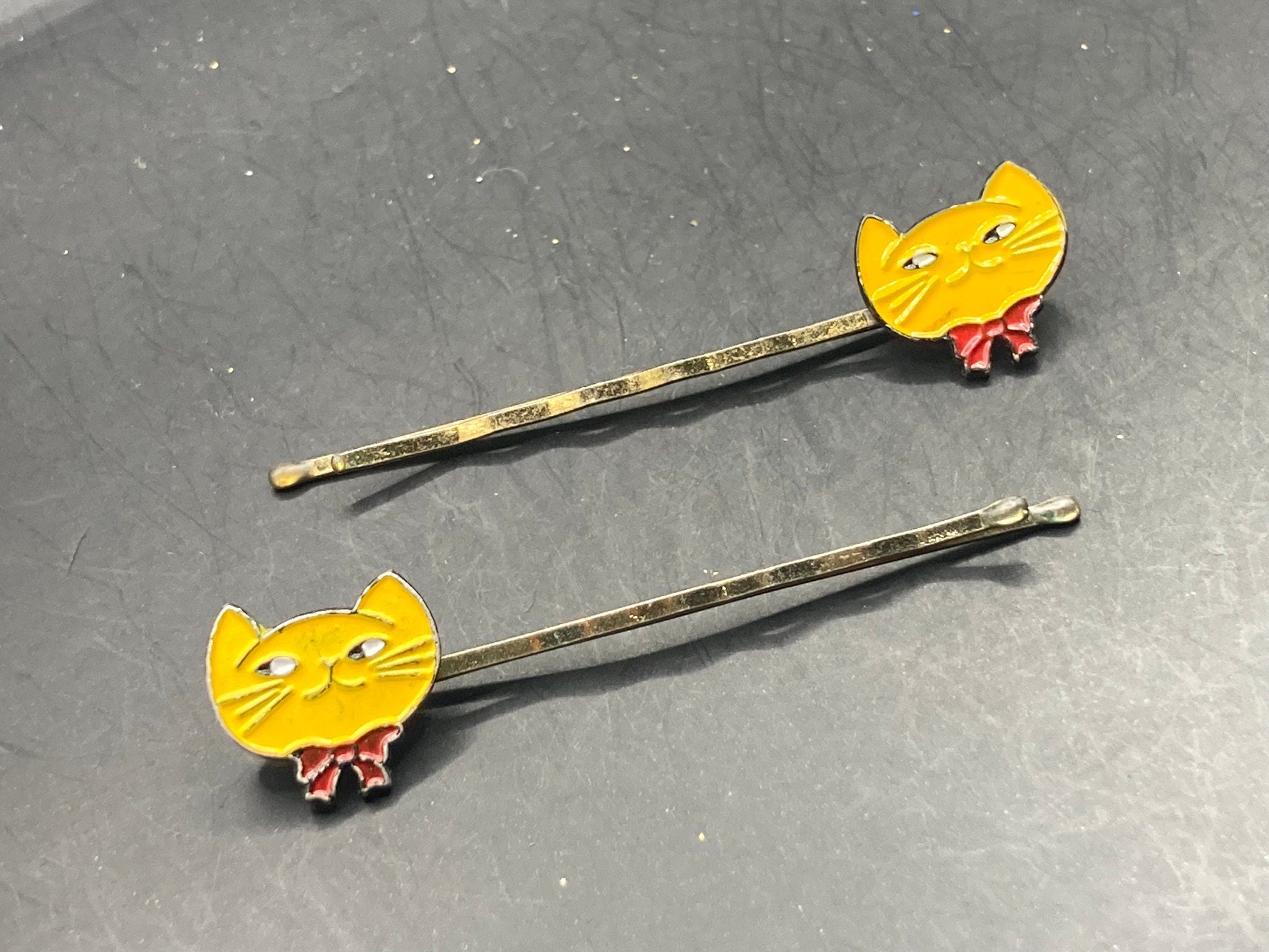 Pair yellow enamel cat girls hair slides