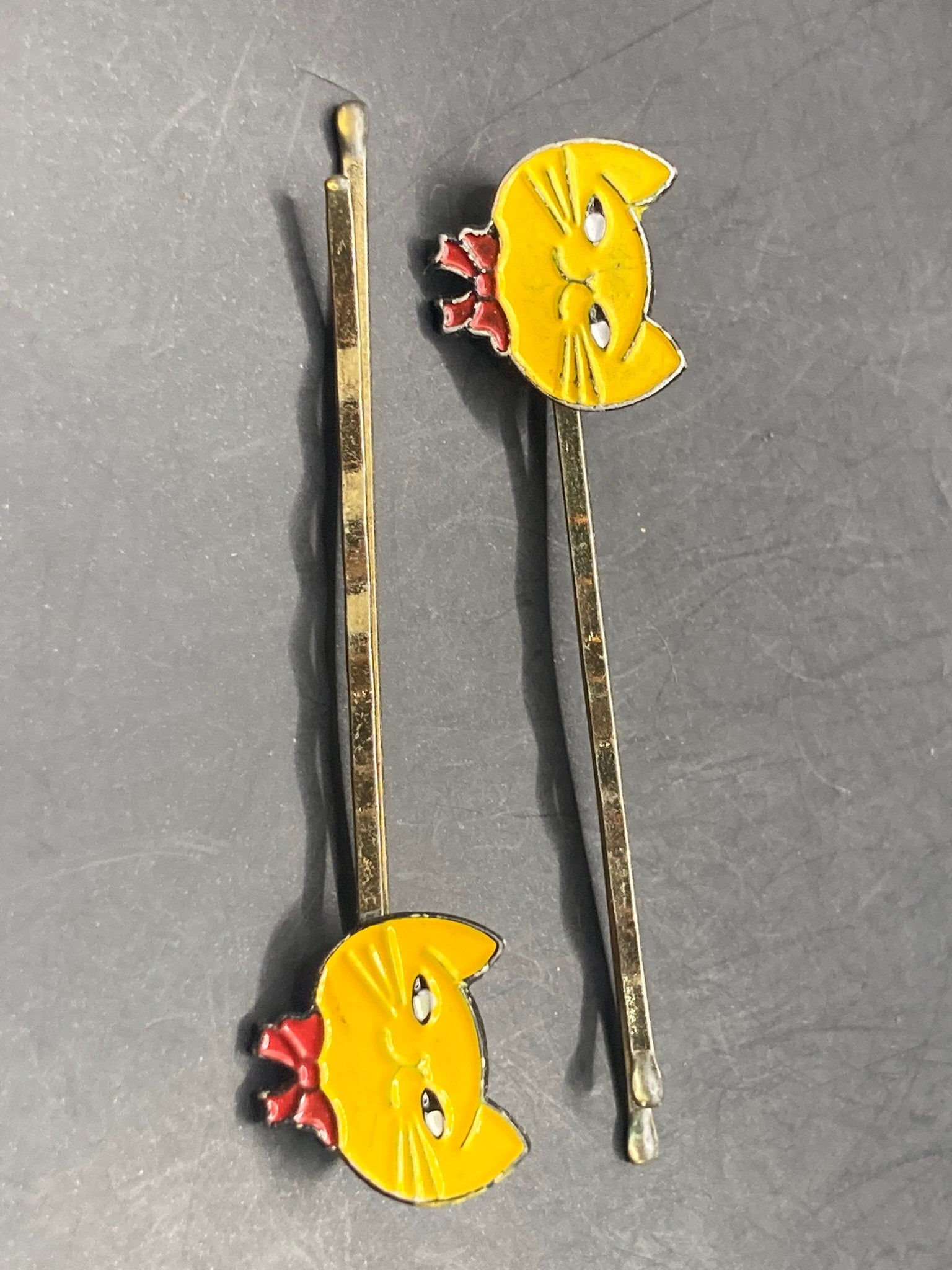 Pair yellow enamel cat girls hair slides