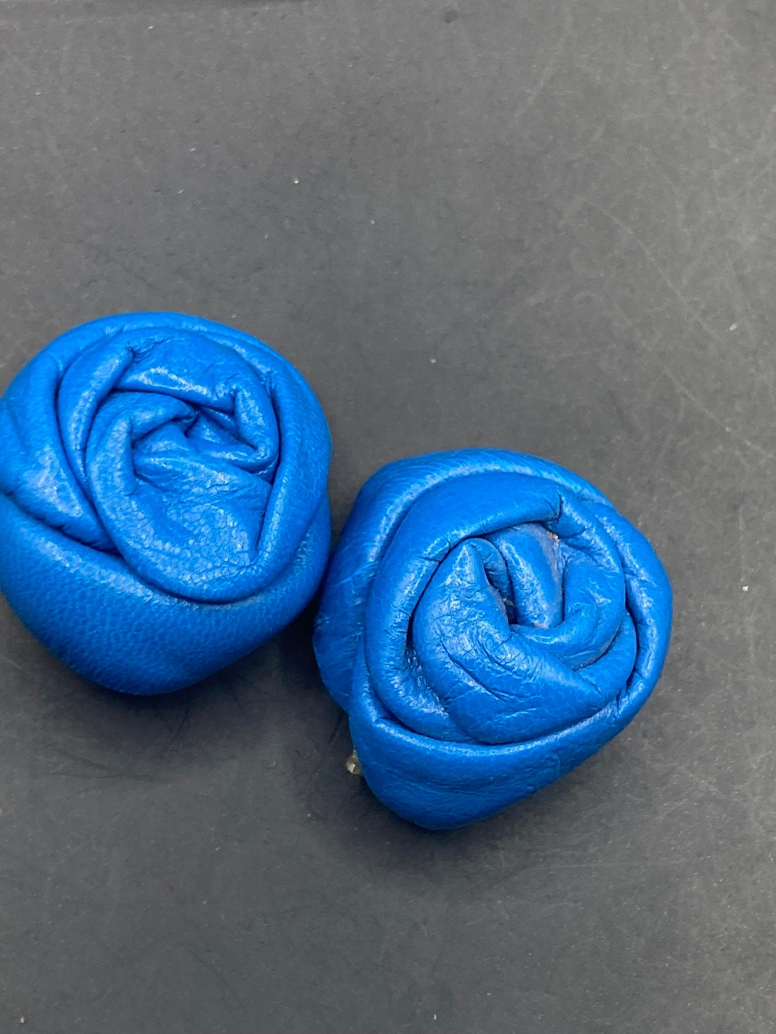 Vintage soft Leather pair of bright blue flower twist shoe clips 1980s