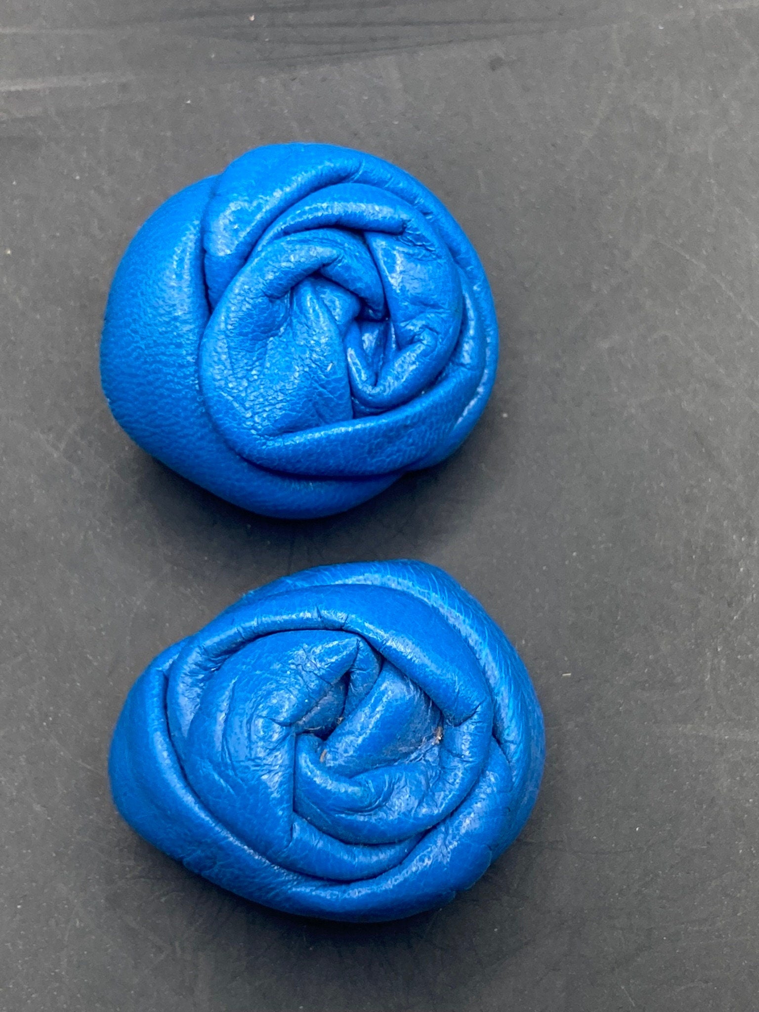 Vintage soft Leather pair of bright blue flower twist shoe clips 1980s