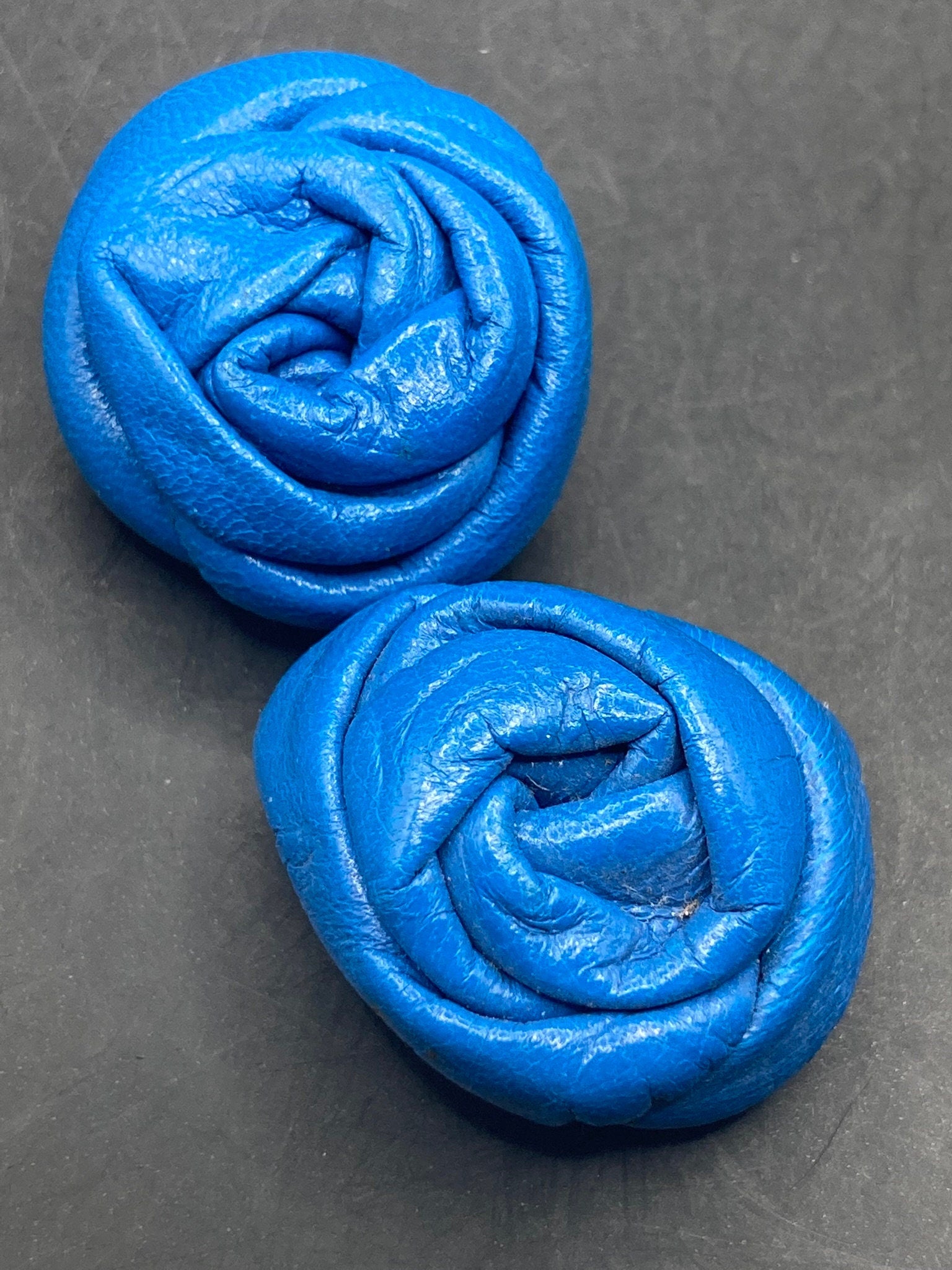 Vintage soft Leather pair of bright blue flower twist shoe clips 1980s
