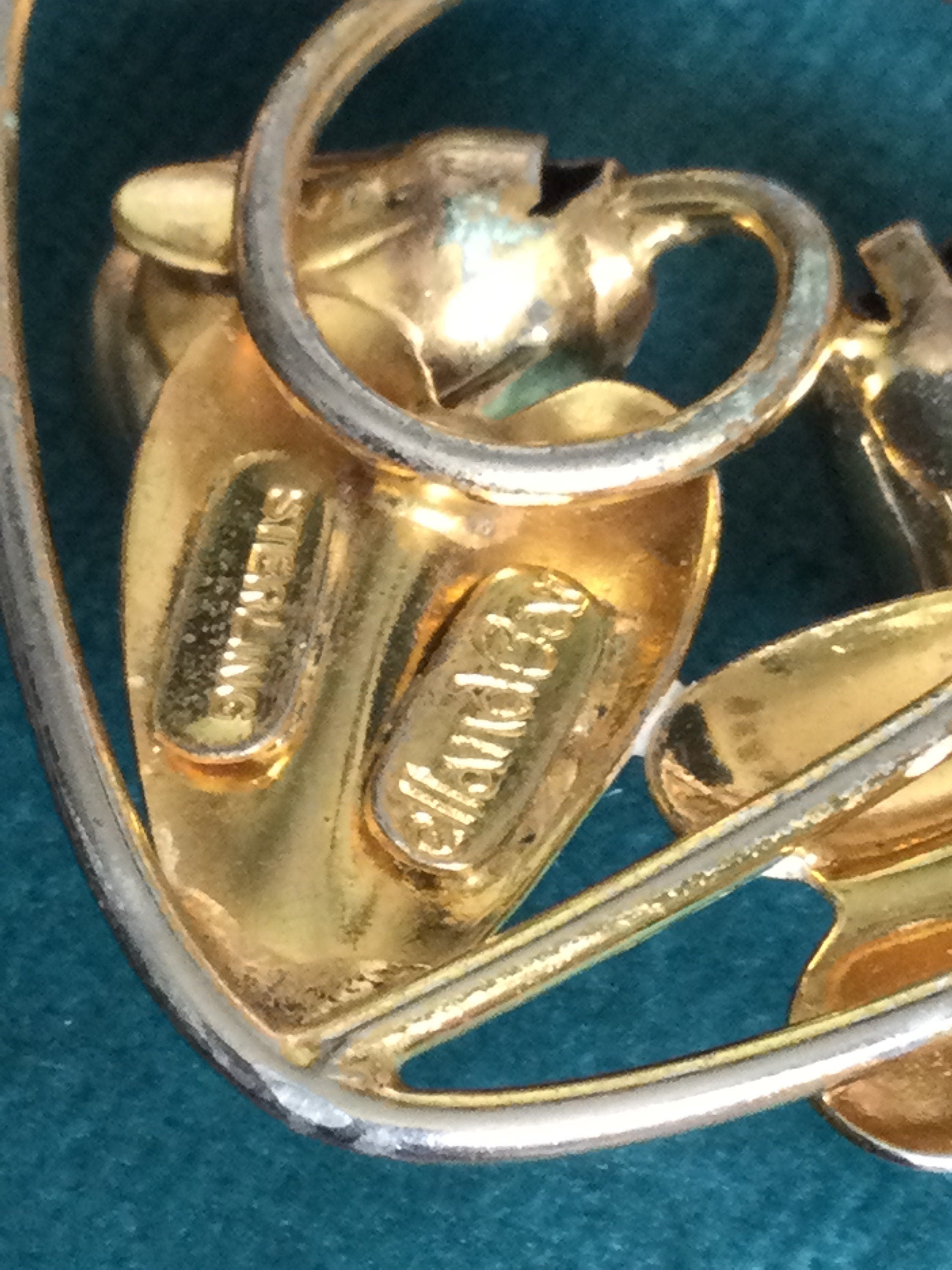 Signed McClelland Barclay 925 sterling silver embossed flower brooch