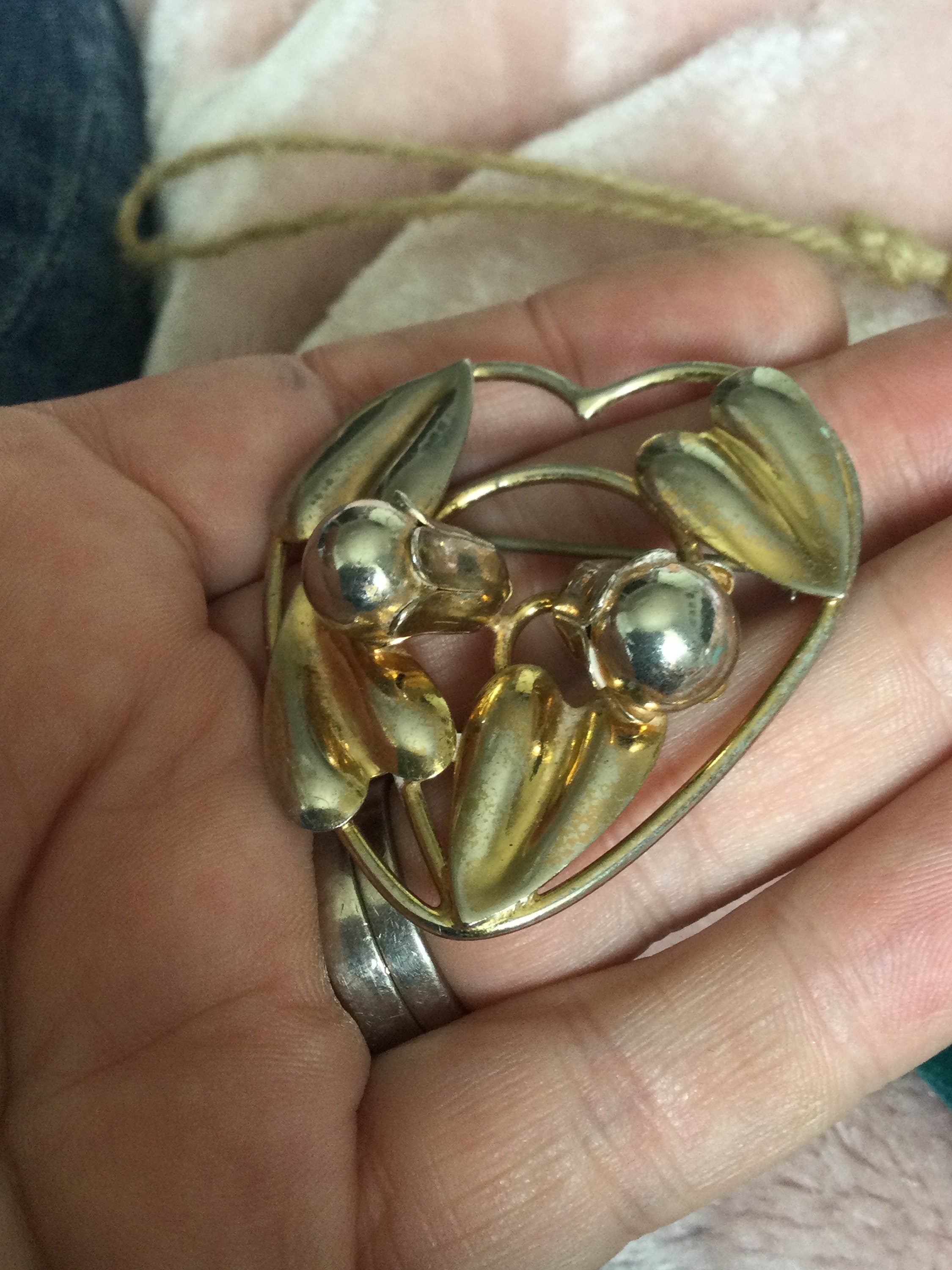 Signed McClelland Barclay 925 sterling silver embossed flower brooch