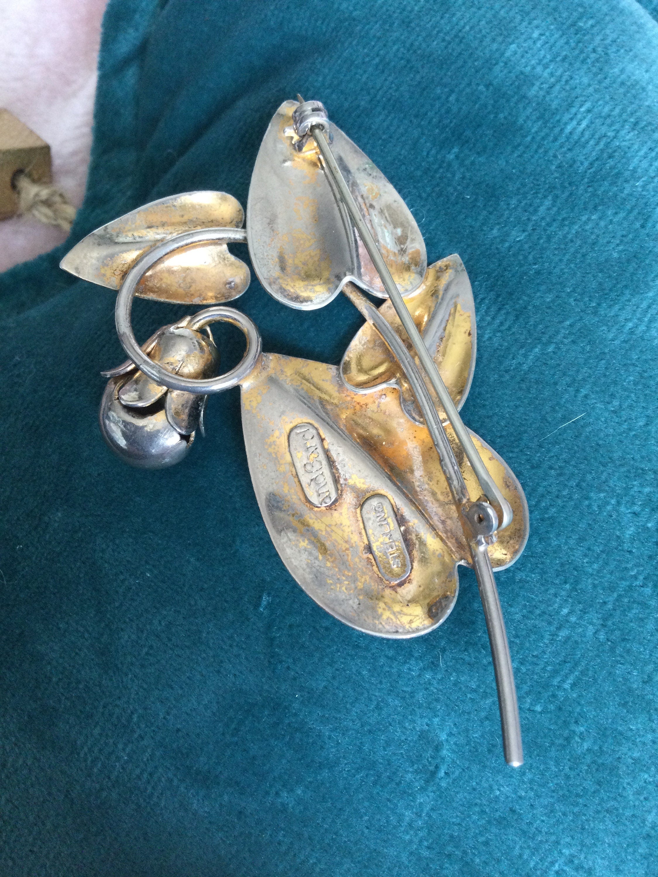 Signed McClelland Barclay 925 sterling silver embossed flower brooch