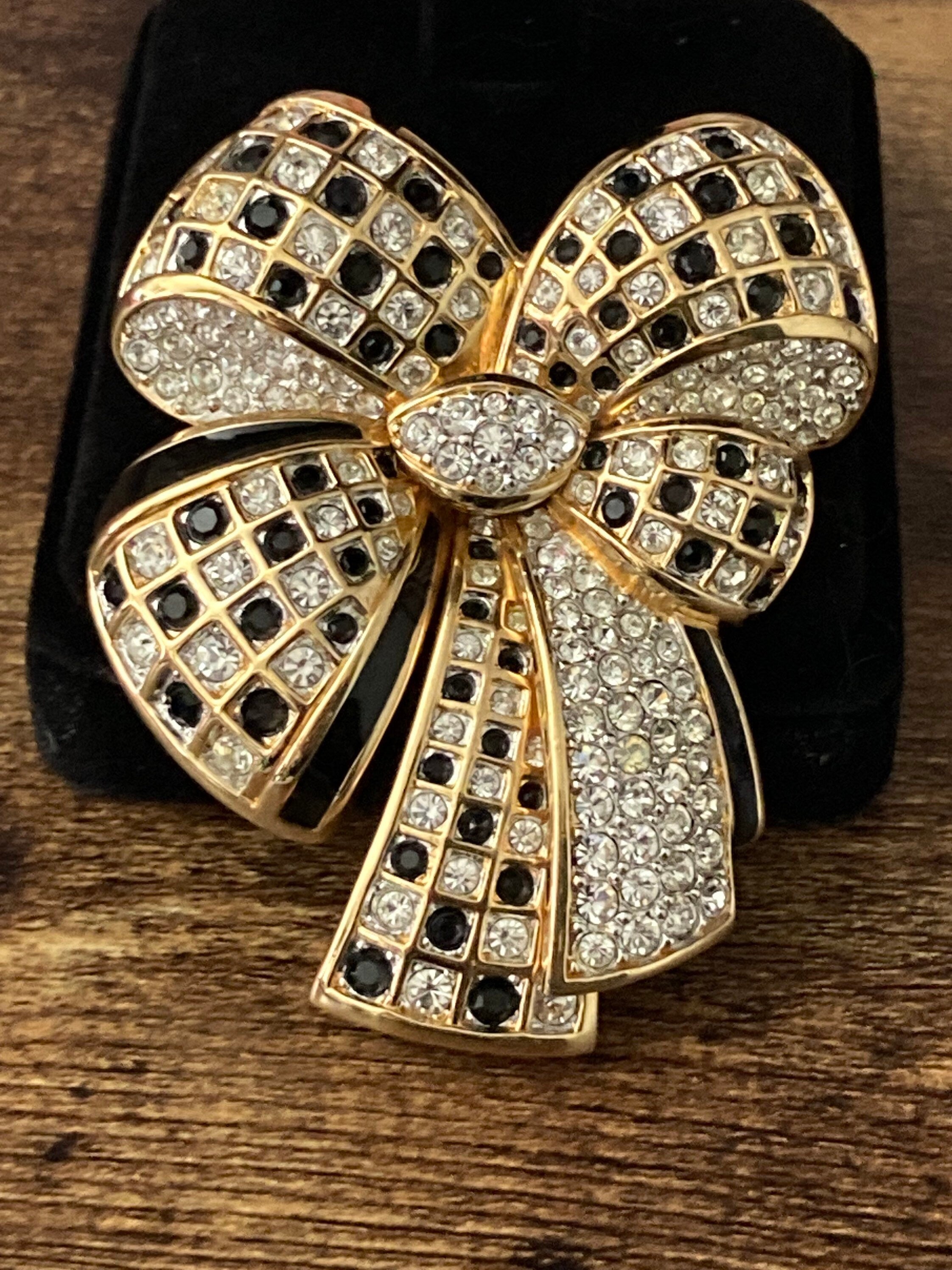 Swarovski crystal black & clear diamanté bow clip on earrings and brooch, signed jewellery set