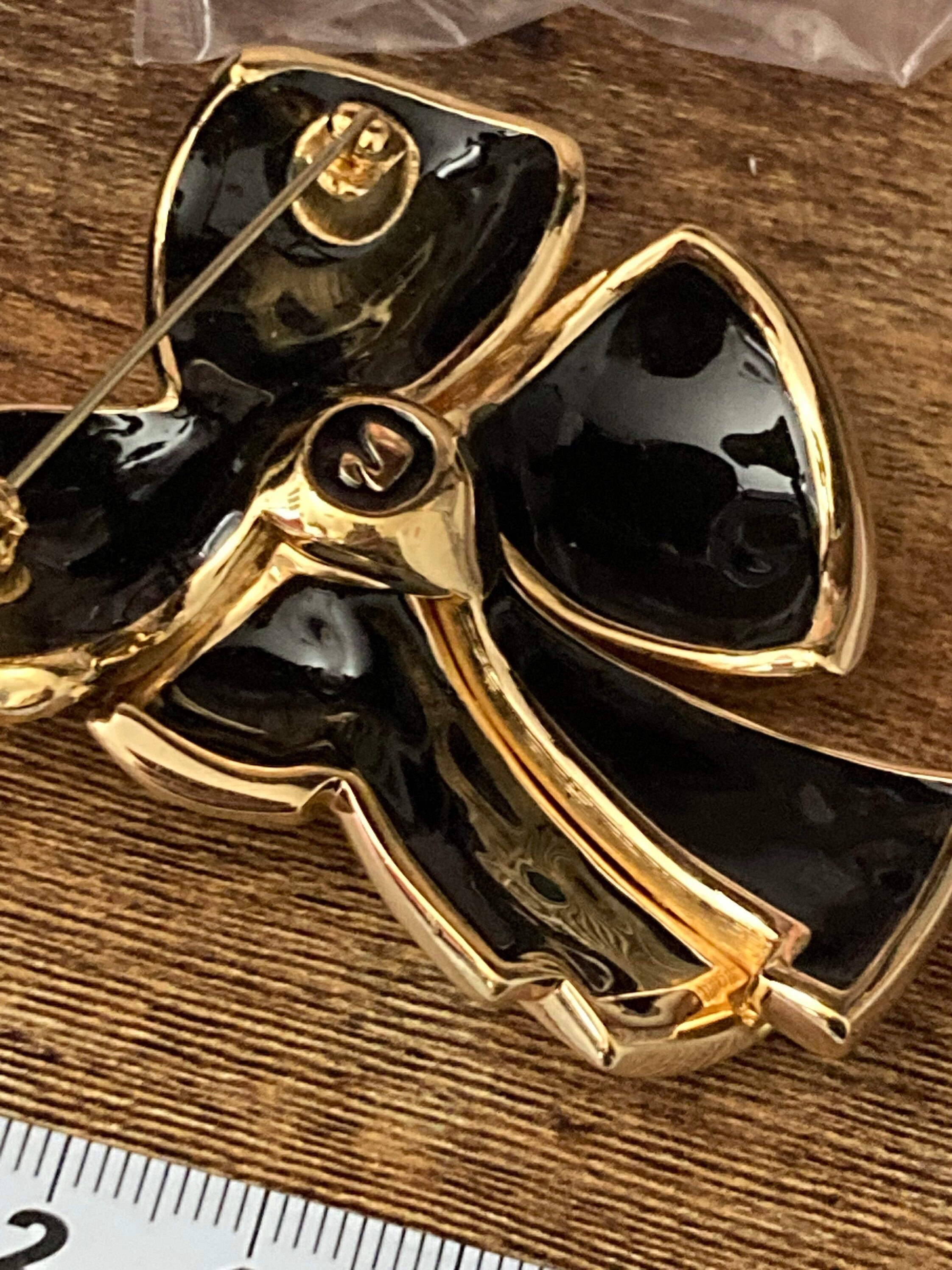 Swarovski crystal black & clear diamanté bow clip on earrings and brooch, signed jewellery set