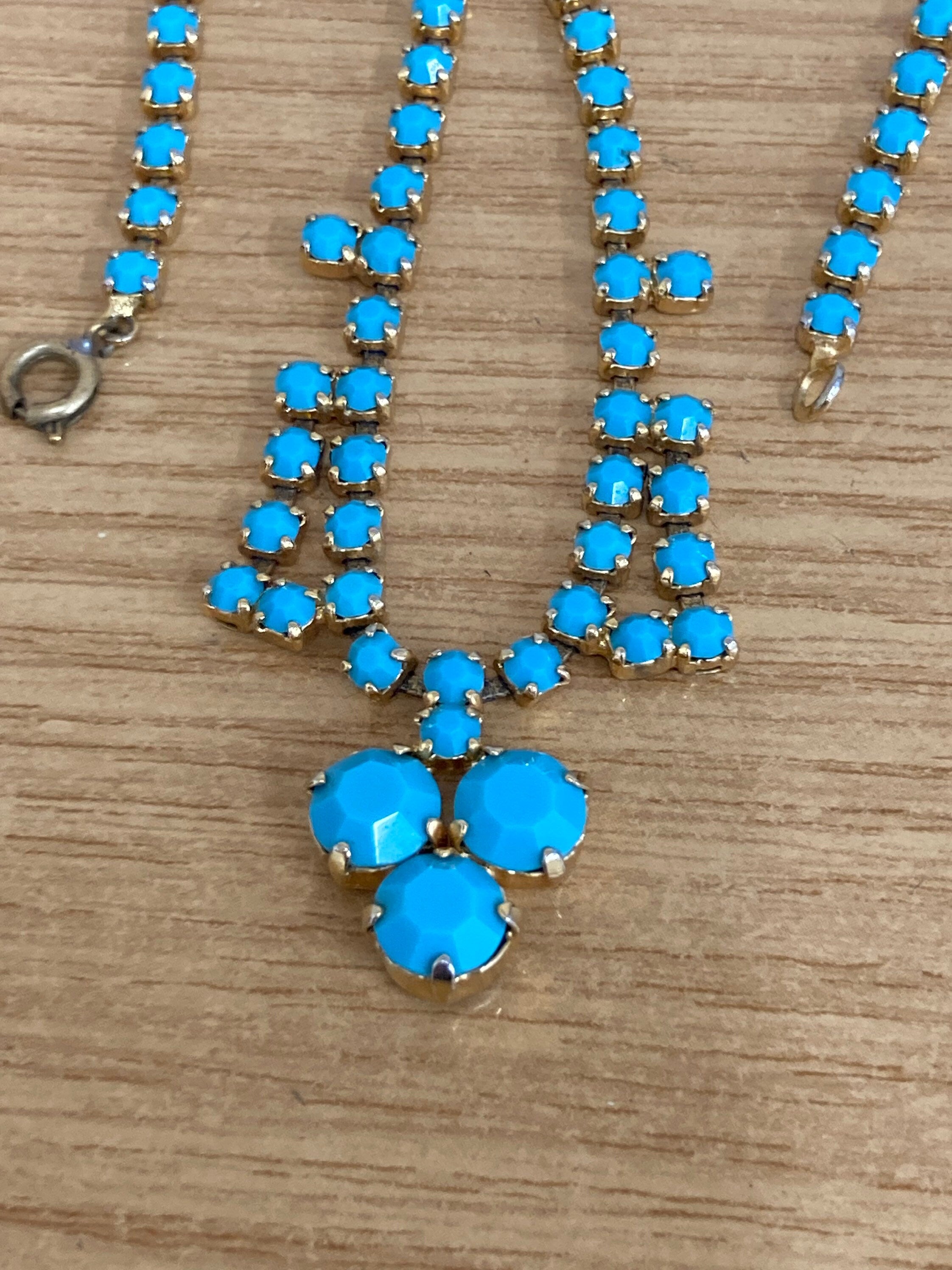 Vintage 1960s gold tone drop necklace with turquoise glass paste stones