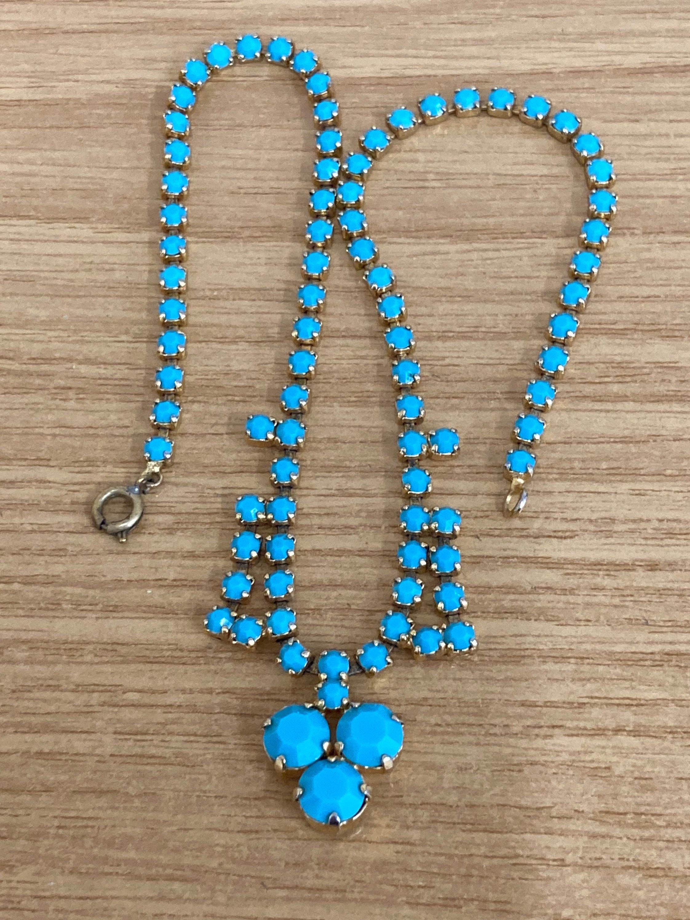 Vintage 1960s gold tone drop necklace with turquoise glass paste stones