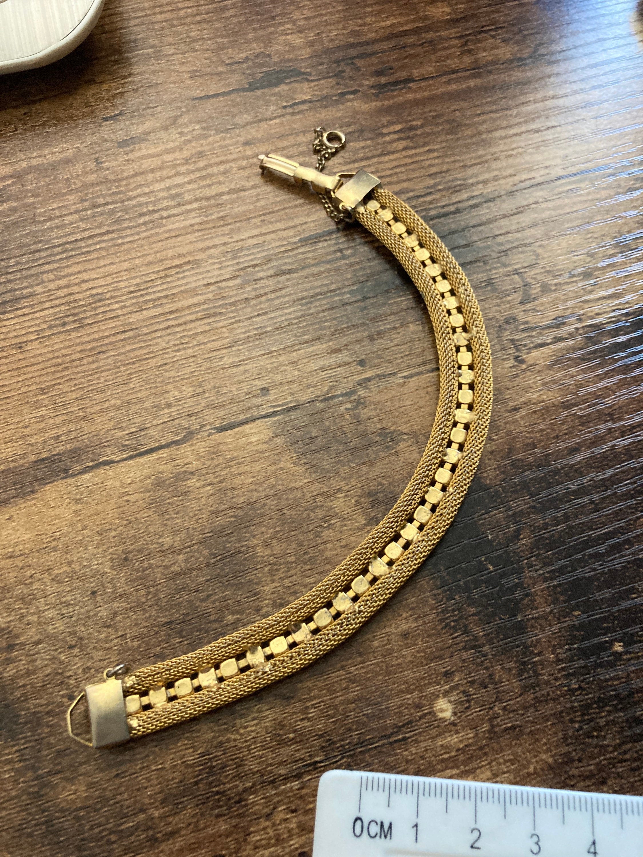 Vintage gold tone cuff bracelet with turquoise blue paste