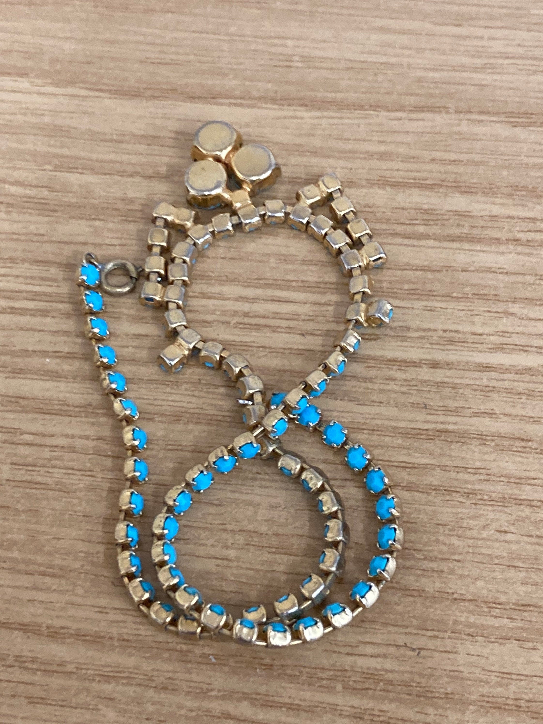 Vintage 1960s gold tone drop necklace with turquoise glass paste stones