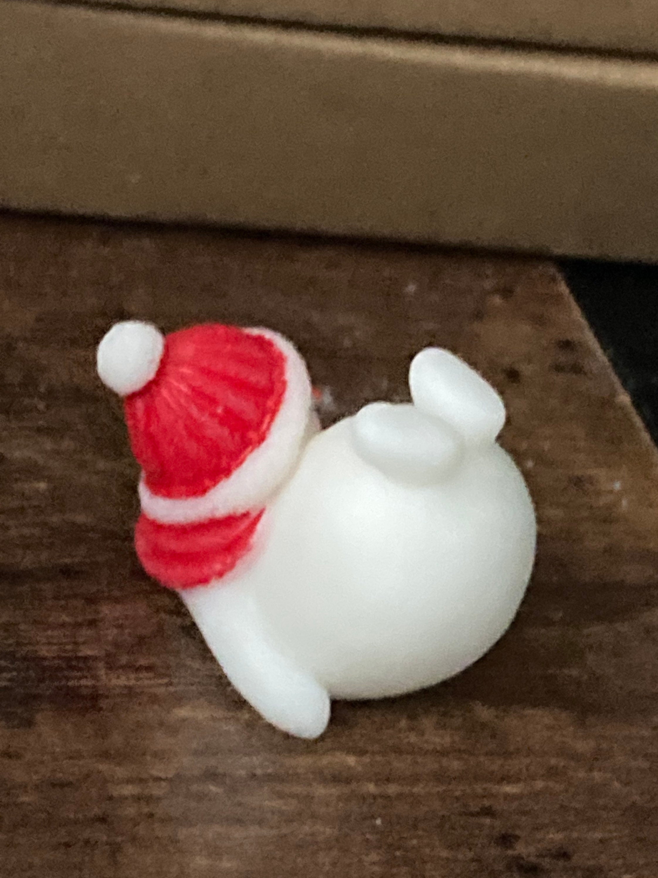 Cute tumbling snowman cake topper in plastic Christmas