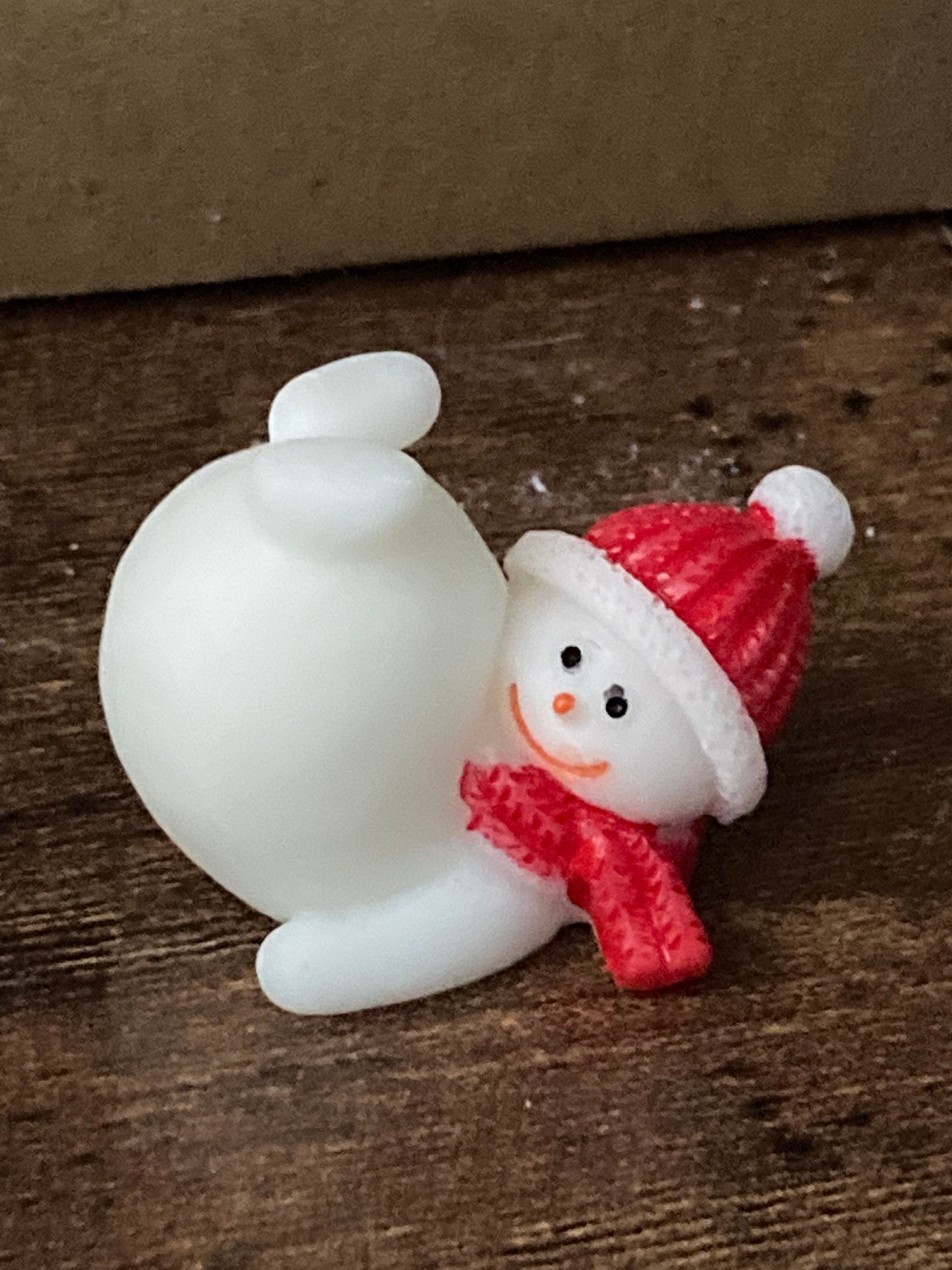 Cute tumbling snowman cake topper in plastic Christmas