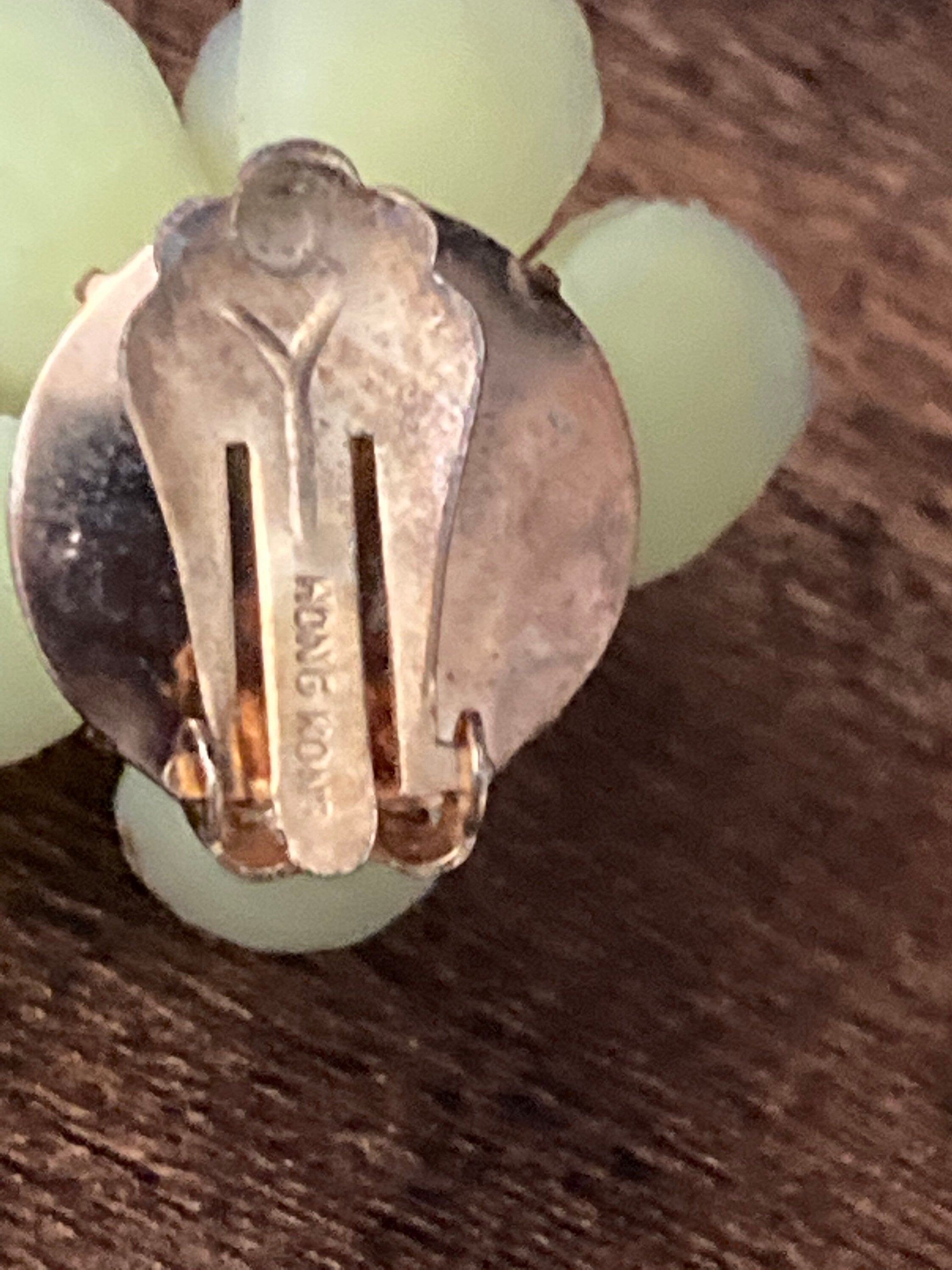 Signed Vintage primrose yellow floral flower soft rubber plastic Clip On Earrings HONG KONG